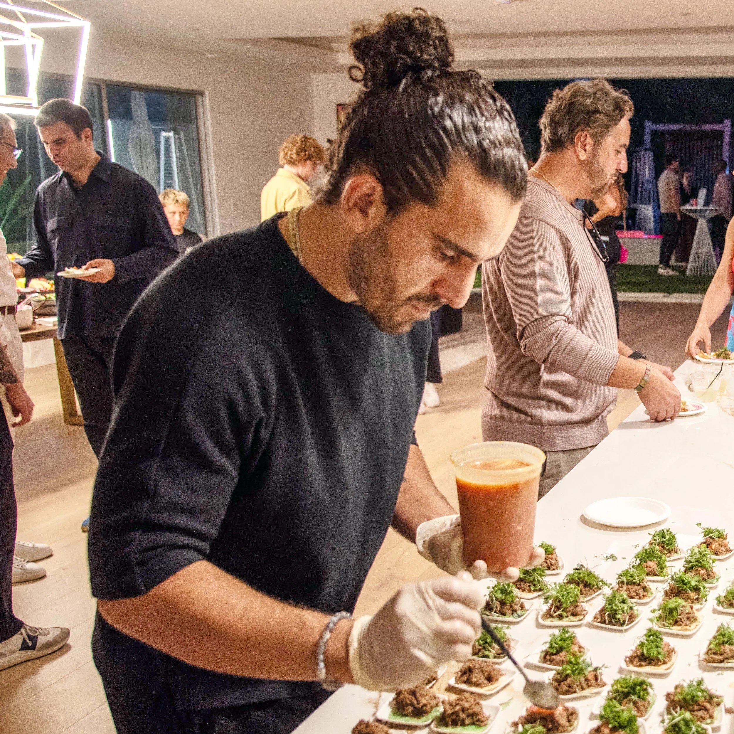 Persian-inspired small bites and salads served by Chef Piaz at a catered event