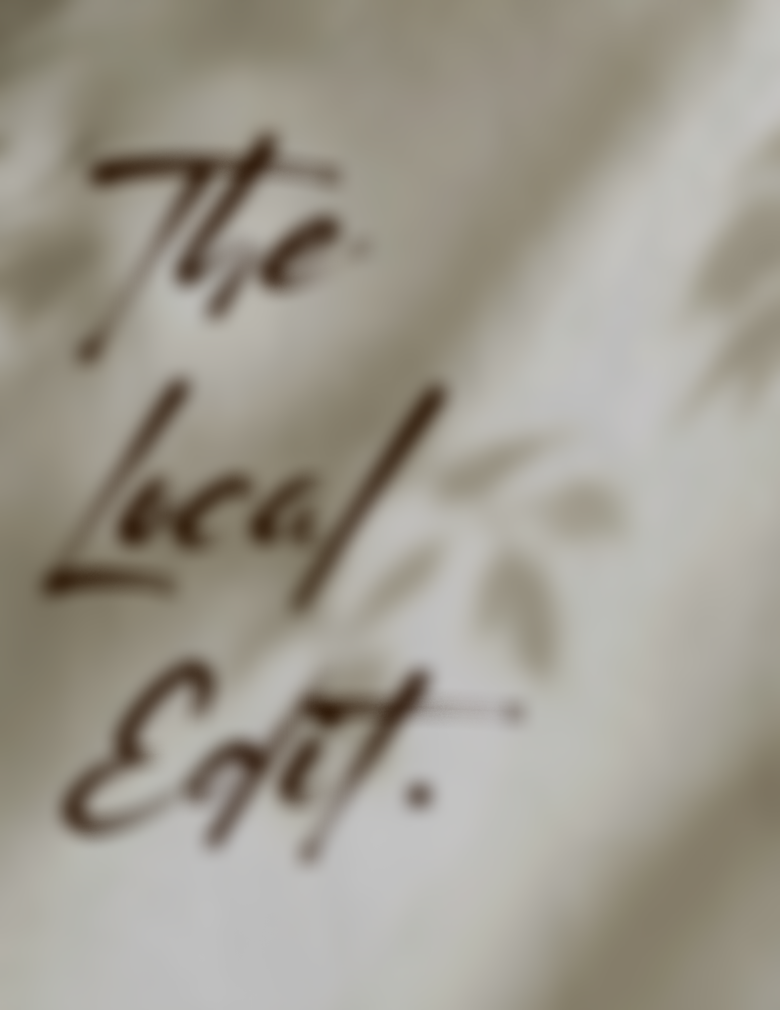Close-up of printed text on fabric with the words 'The'.