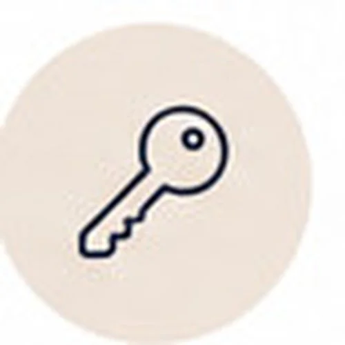 Simple line drawing of a key on a light background.