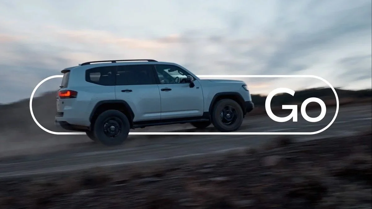 Toyota Go: a LandCruiser driving at dusk