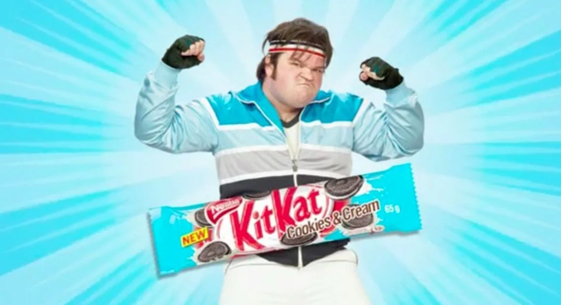 Chunga legend Hans Fagerlund flexing behind a Kit Kat Cookies and Cream Chunky bar