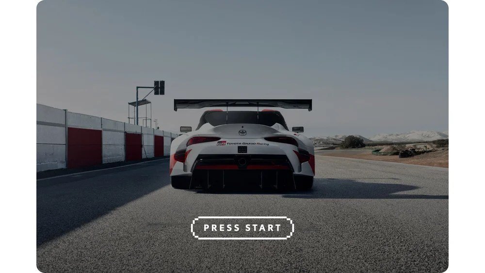 Toyota GR Supra on track with a Press Start button