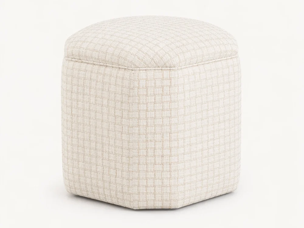 Cream-colored upholstered ottoman with a textured pattern against a white background.