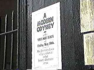 Poster advertising a modern comedy at the Village Hall on Friday, May 30th.