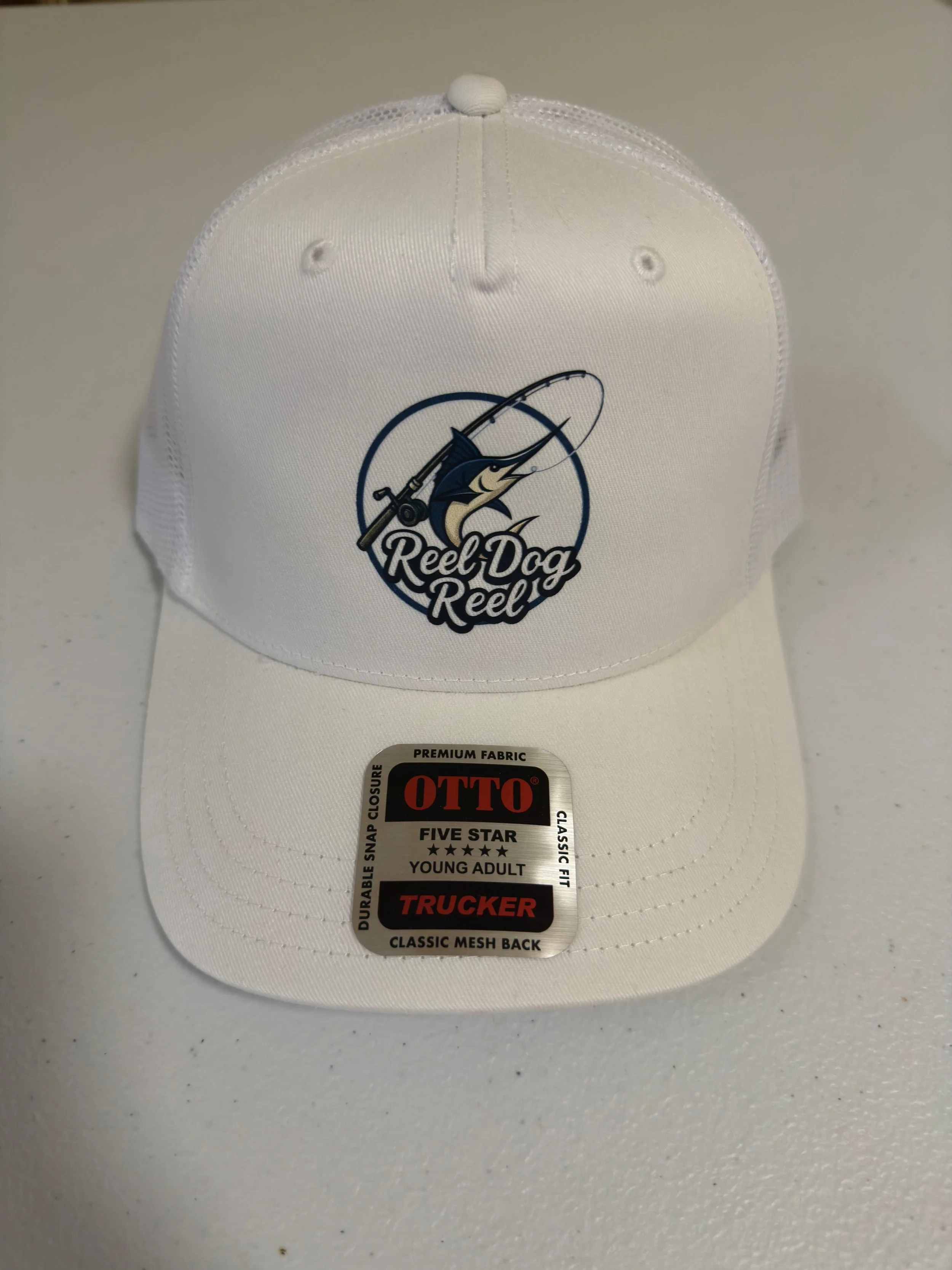 White Youth Snap Back Reel Dog Reel Hat Front.jpg