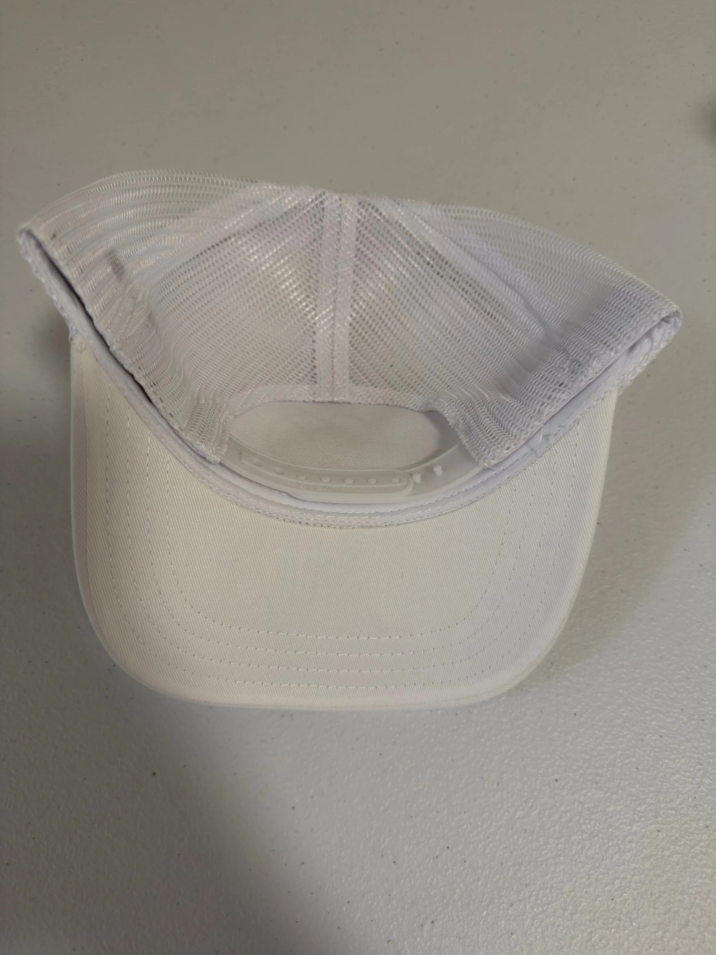 White Youth Snap Back Reel Dog Reel Hat Inside.jpg