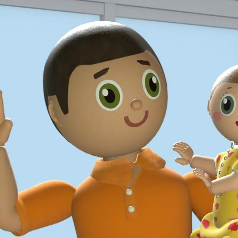 Daddy, smiling and waving, in an orange shirt
