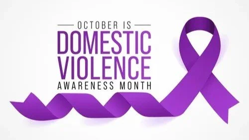 October is Domestic Violence Awareness Month banner with purple awareness ribbon.