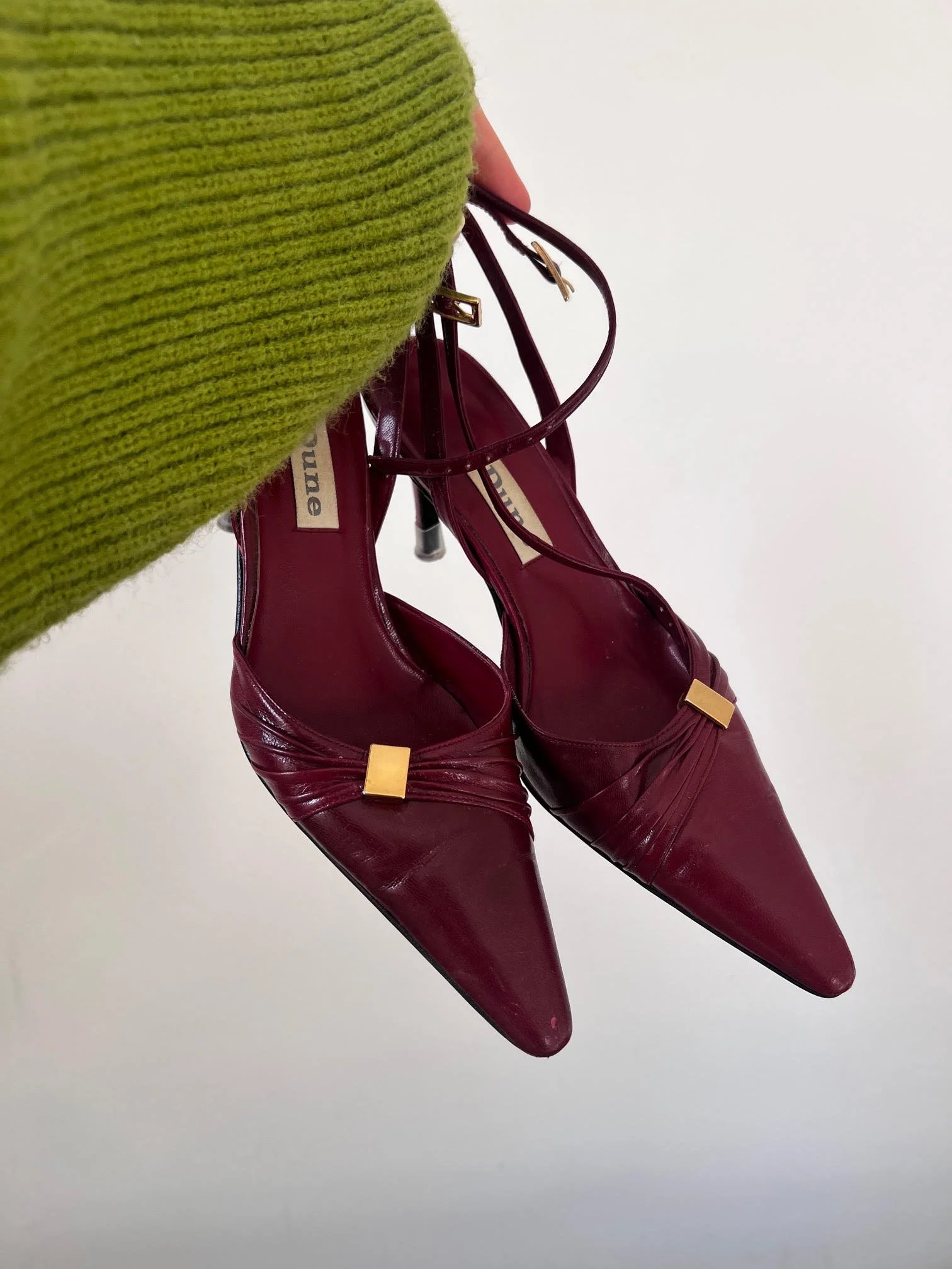 burgundy red leather heels with gold accent, vintage Dune style with made in Spain stamp and original fabric logo on sole.