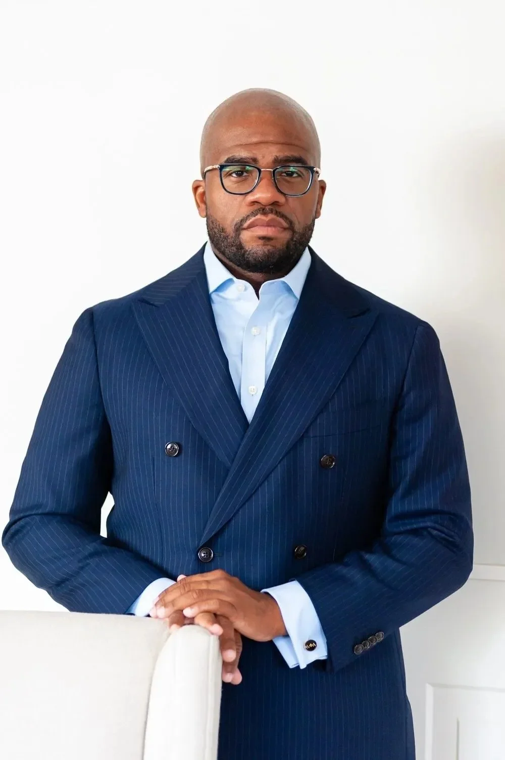 Watson Jones III, Ph.D., fundraising and leadership consultant, in a navy pinstripe suit