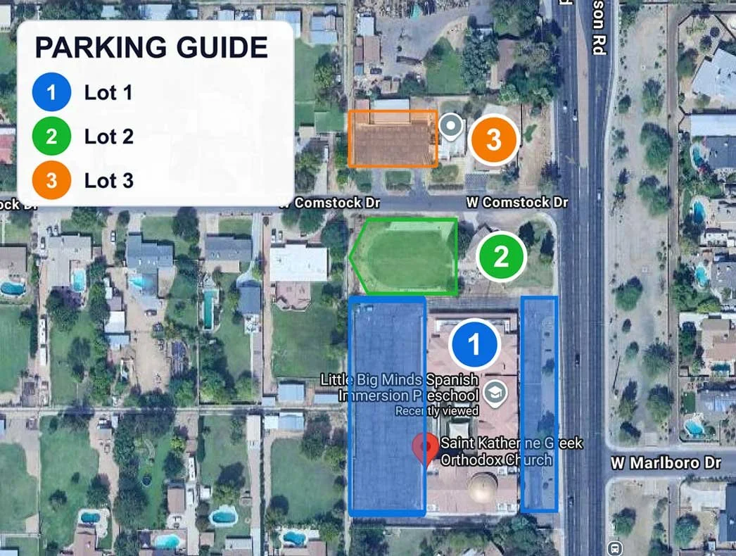 Parking guide map of St. Katherine showing Lot 1 beside the church, Lot 2 (Ministry House lot) north of the church, and Lot 3 (Whelan House lot) north across W Comstock Dr.