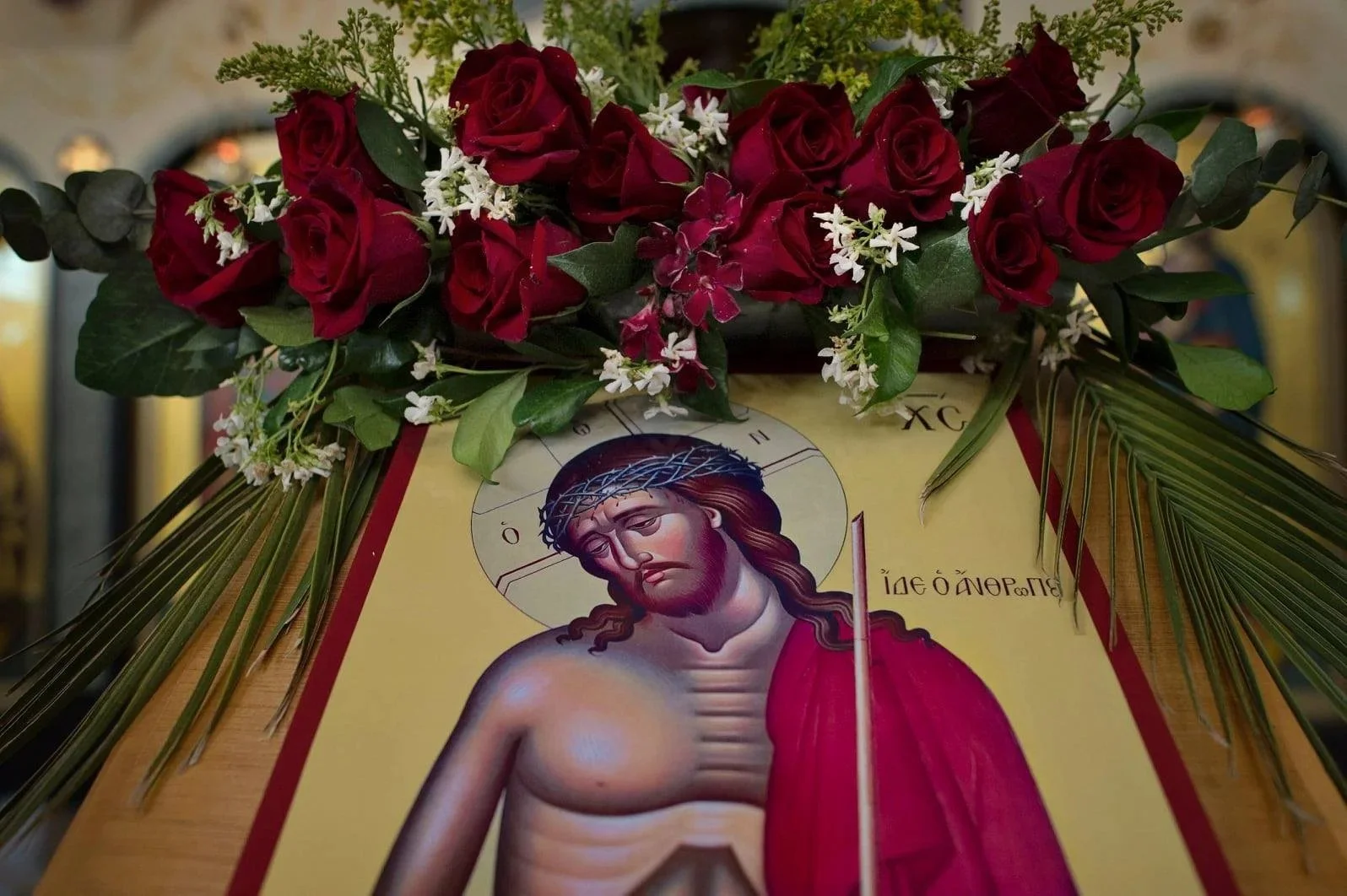 Icon of Christ the Bridegroom beneath red roses