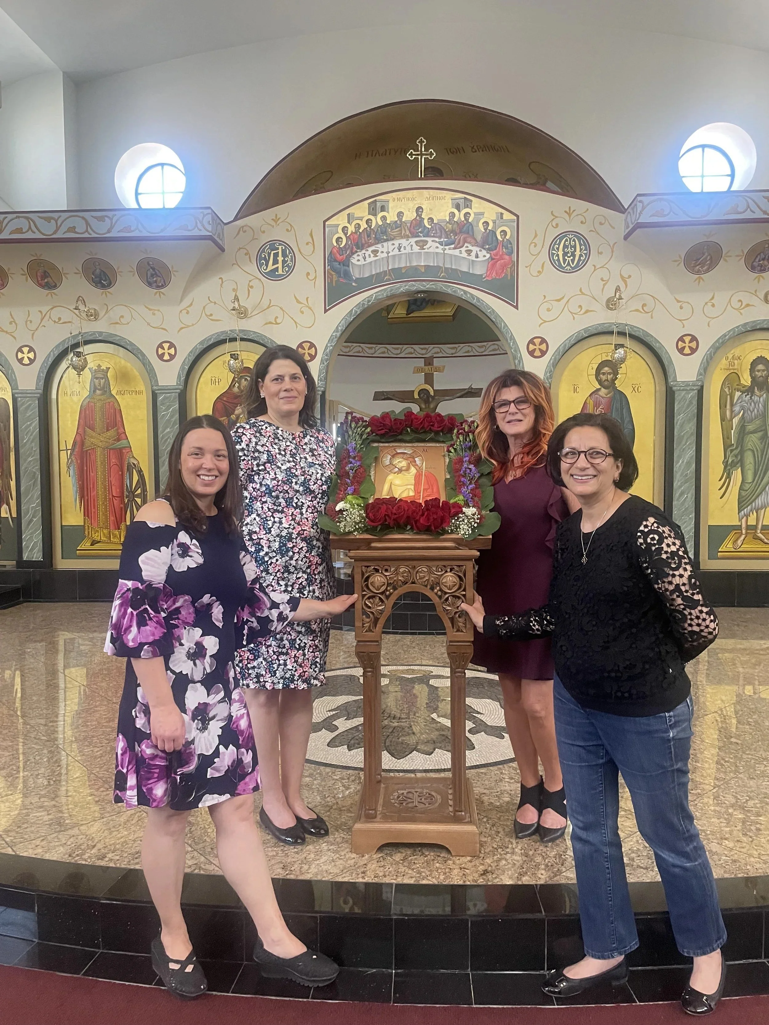 Flower Ministry volunteers in front of the iconostasis