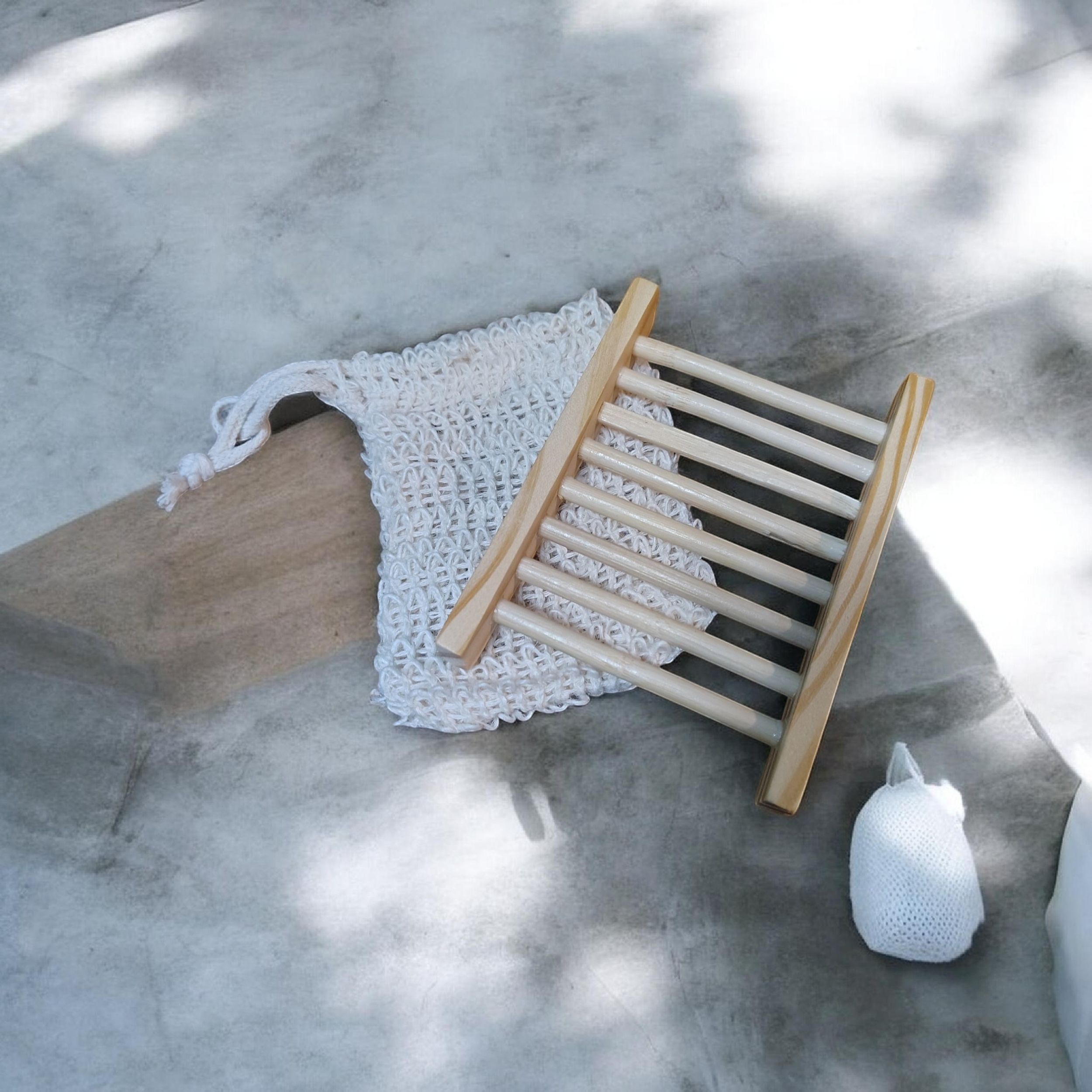 soap saver bag and wooden ladder soap holder.png