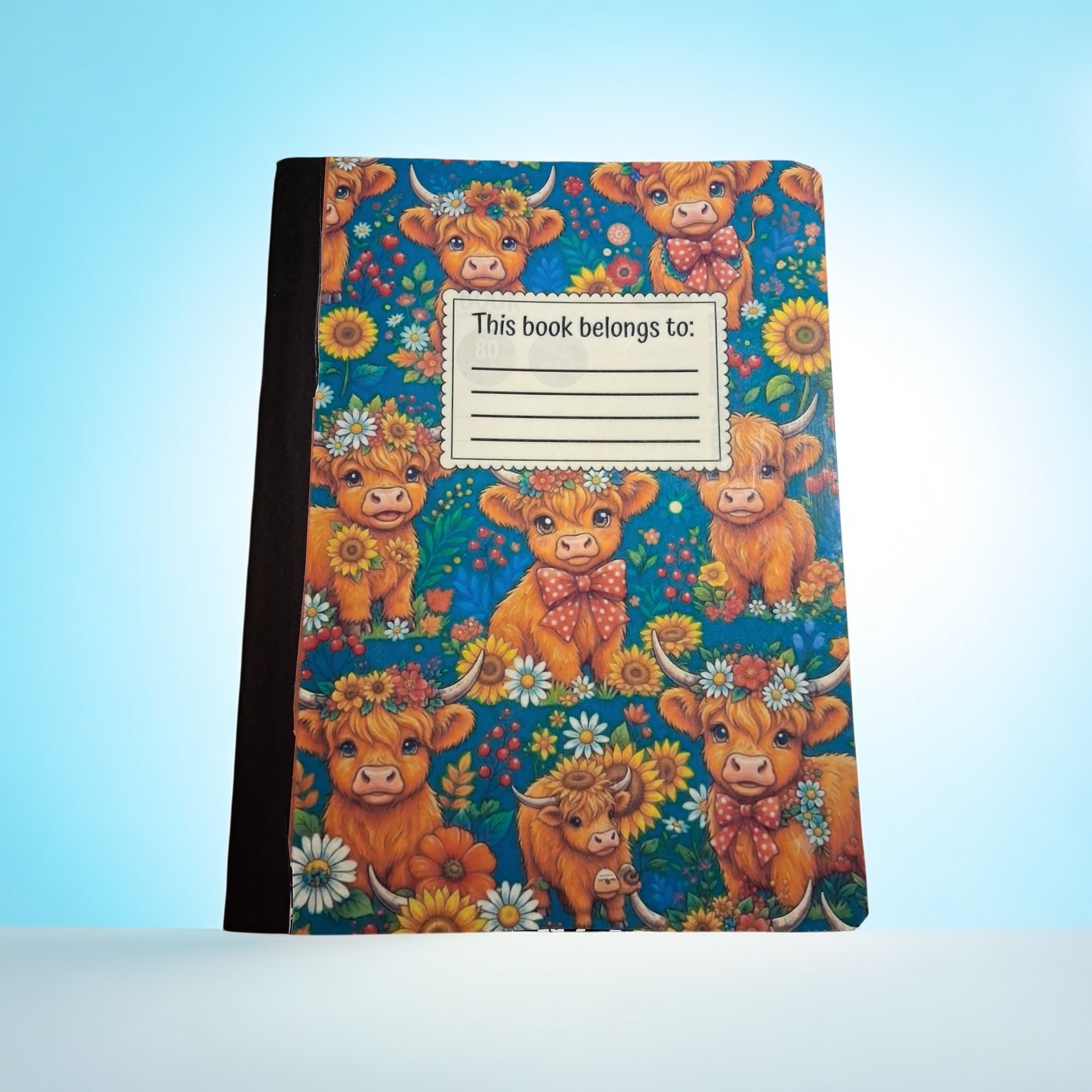 highland cow composition book front.png
