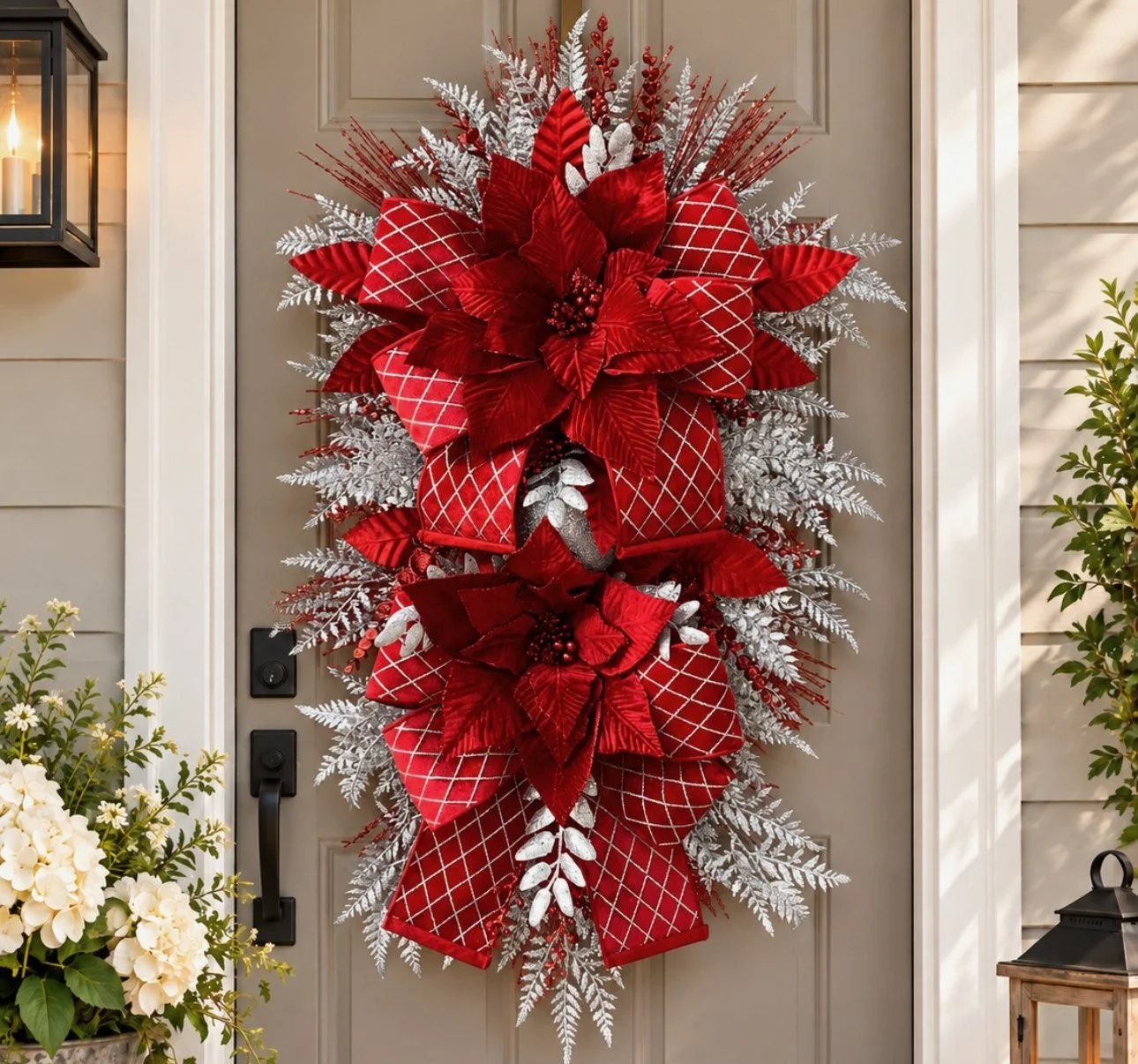 Handmade red poinsettia Christmas swag with silver ferns