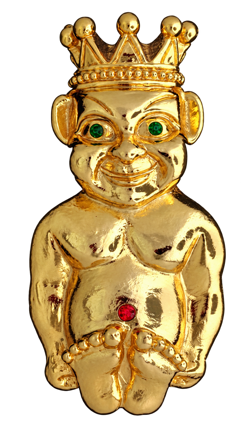 Gold-colored figurine of a cheerful, nude, childlike figure with green eyes, wearing a crown, and with a red gemstone on the lower abdomen.