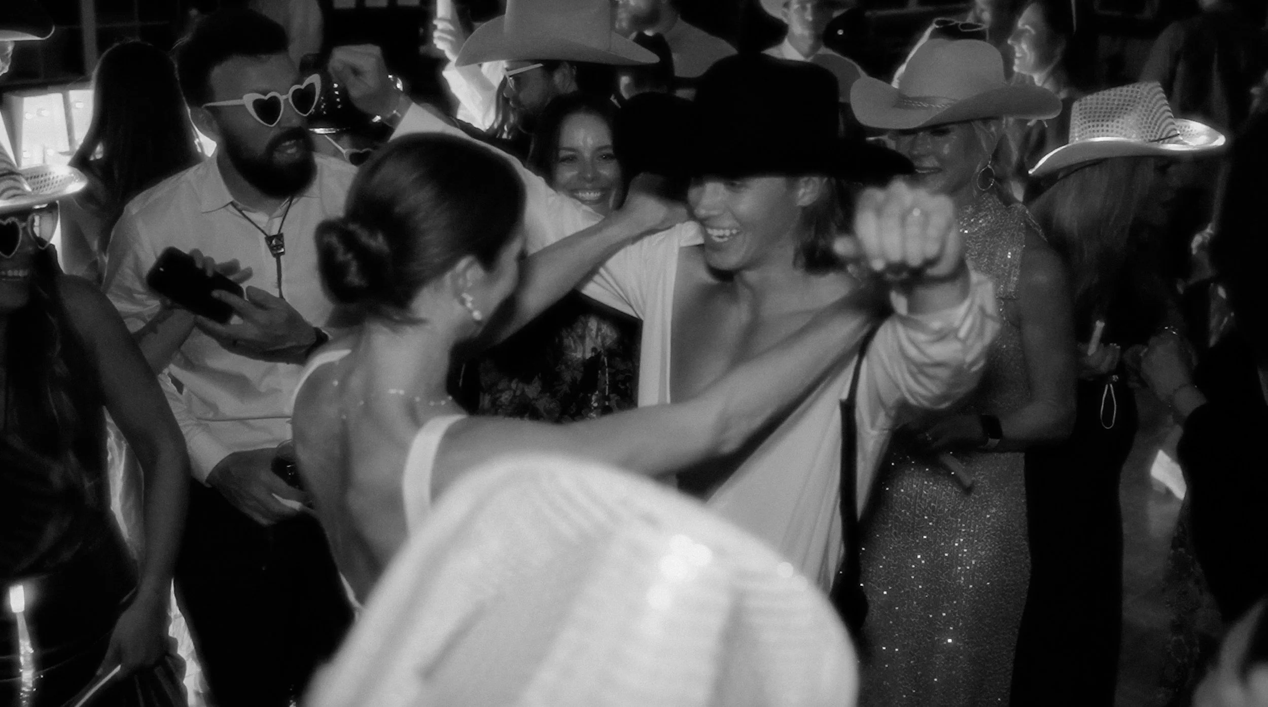 Guests dancing and celebrating together at a lively party, photographed as part of Love, Blair's event content creation portfolio.
