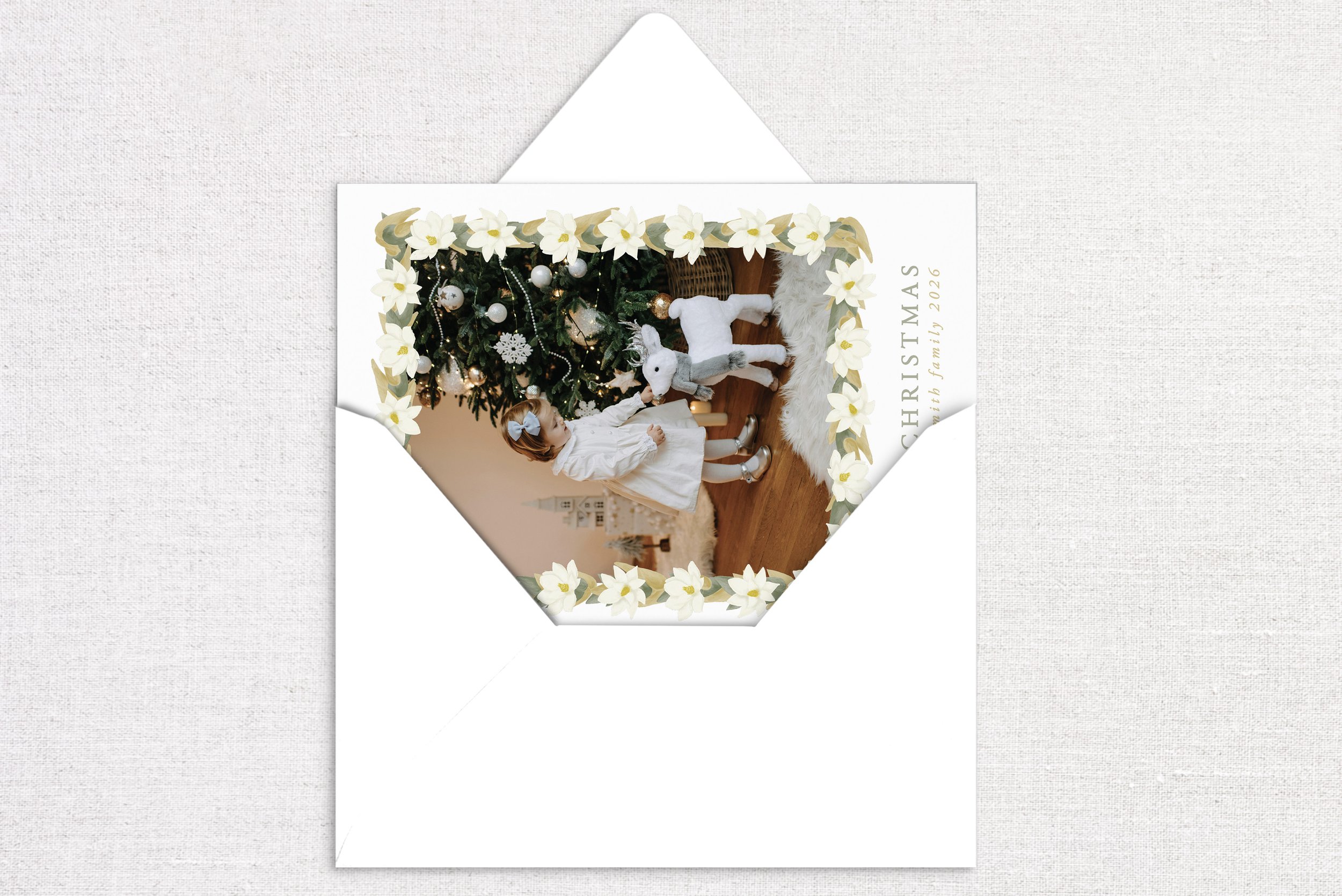 54holiday-card-card-opening-magnolia-garland.jpg