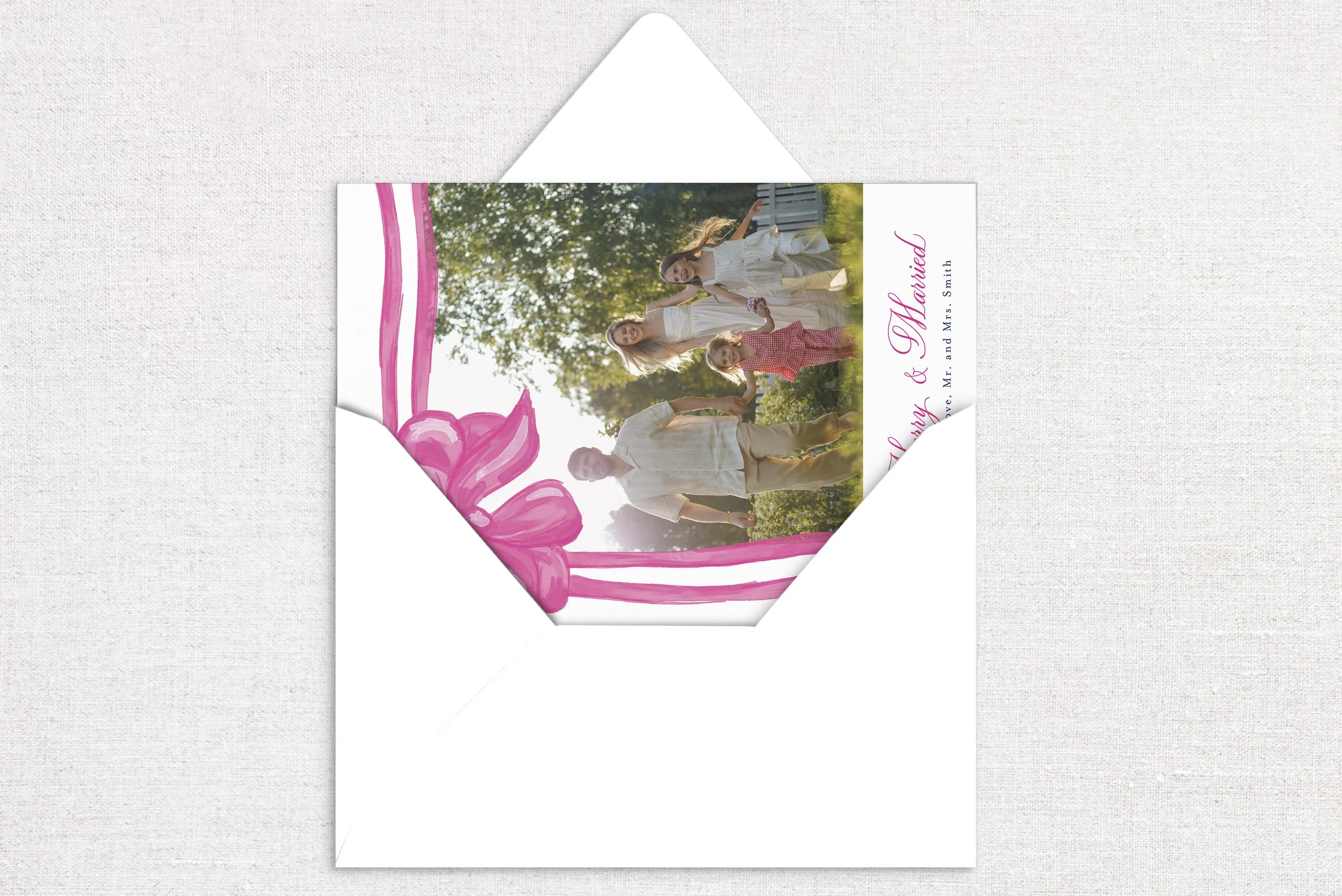 holiday-card-card-opening-gift-bow-pink.jpg