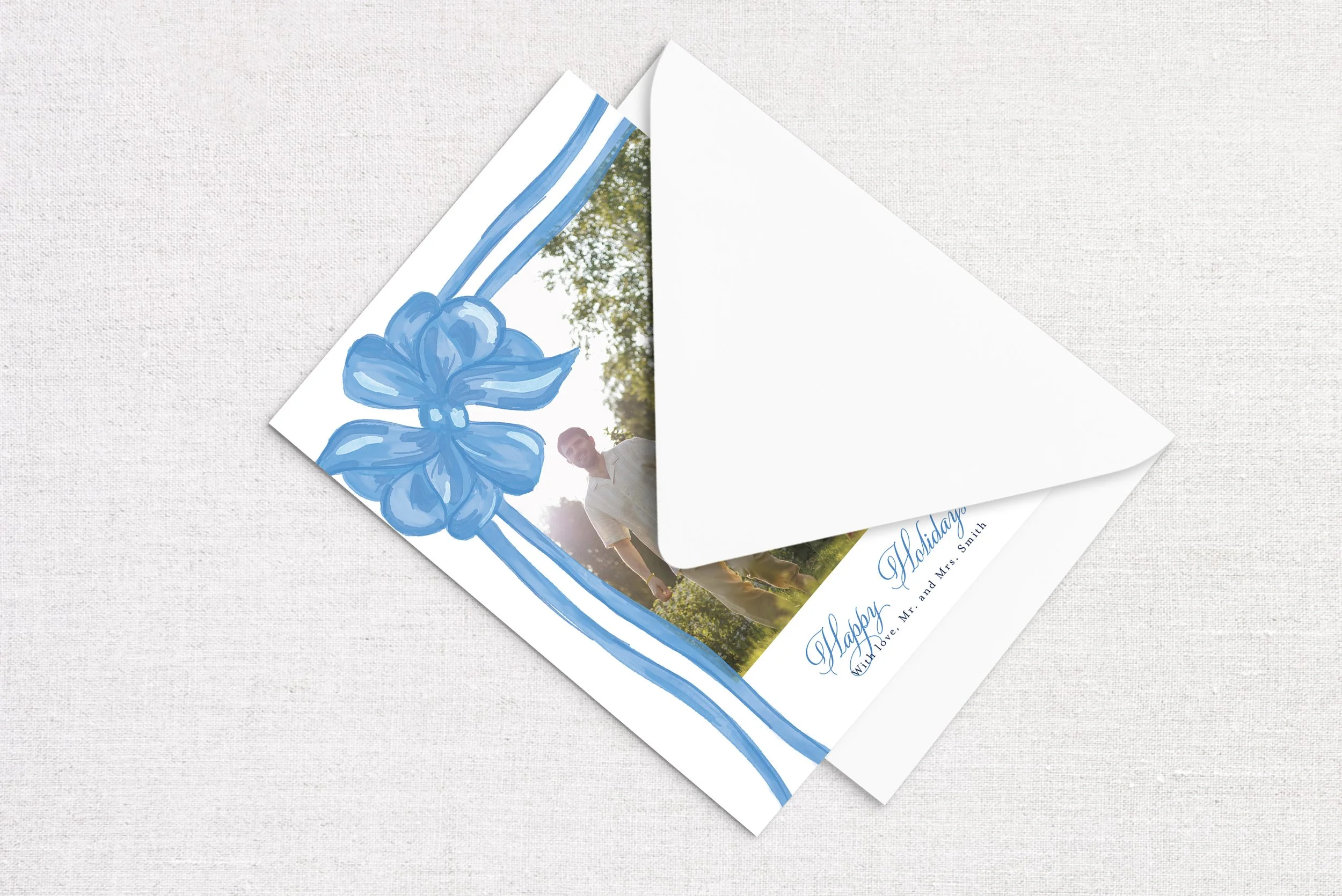 84holiday-card-envelope-gift-bow-blue.jpg