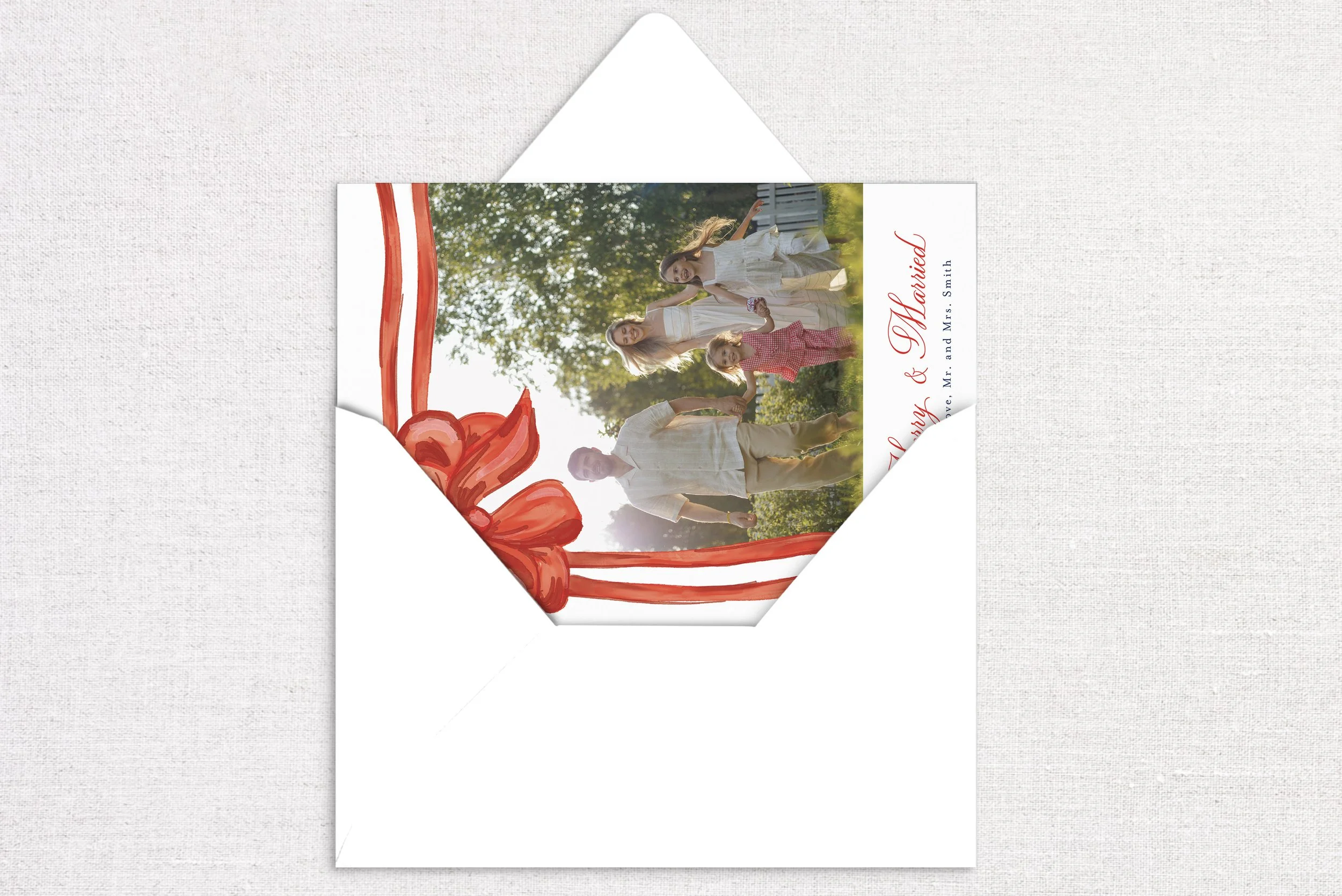 50holiday-card-card-opening-gift-bow-red.jpg