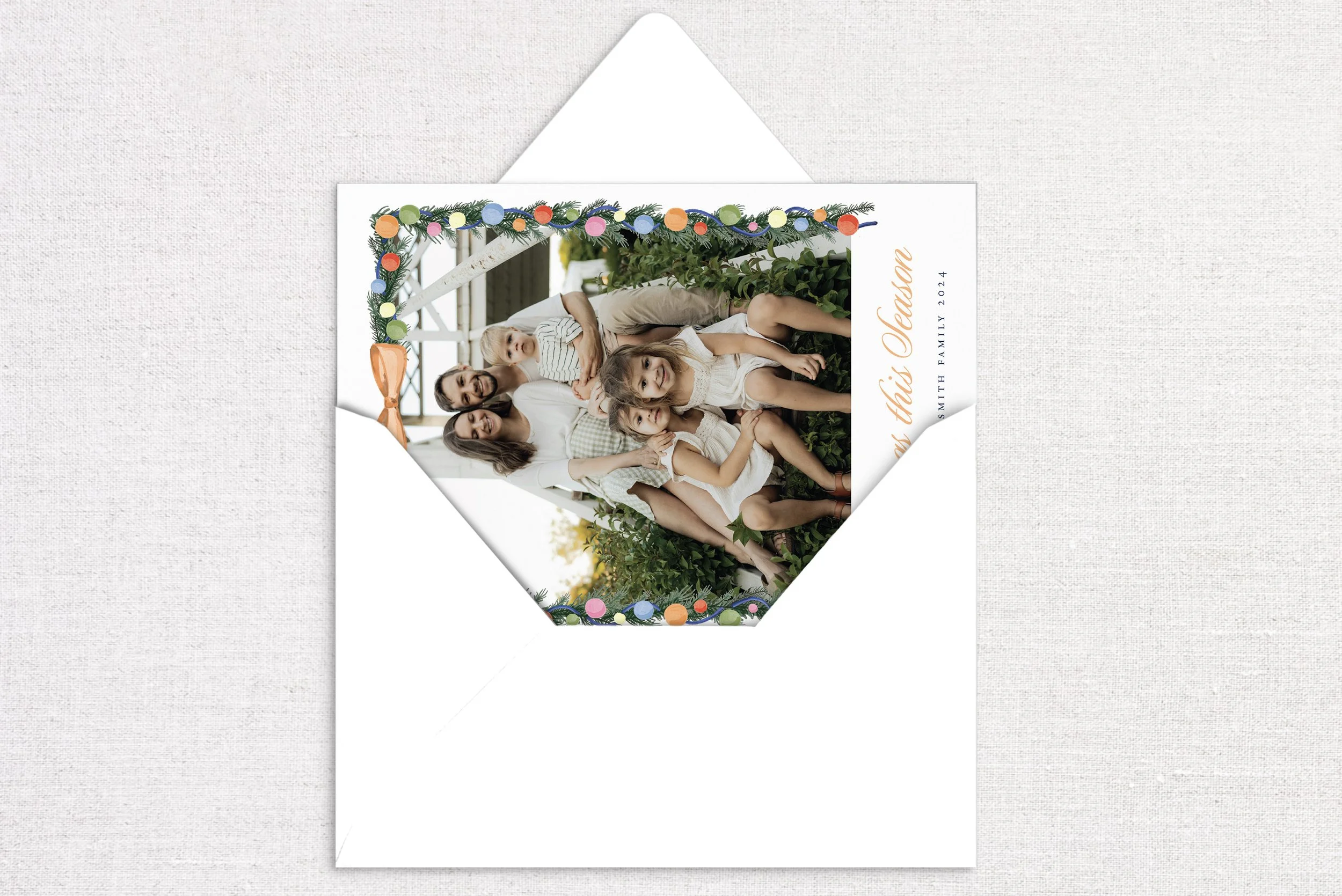 58holiday-card-card-opening-multicolor-ornament-garland.jpg