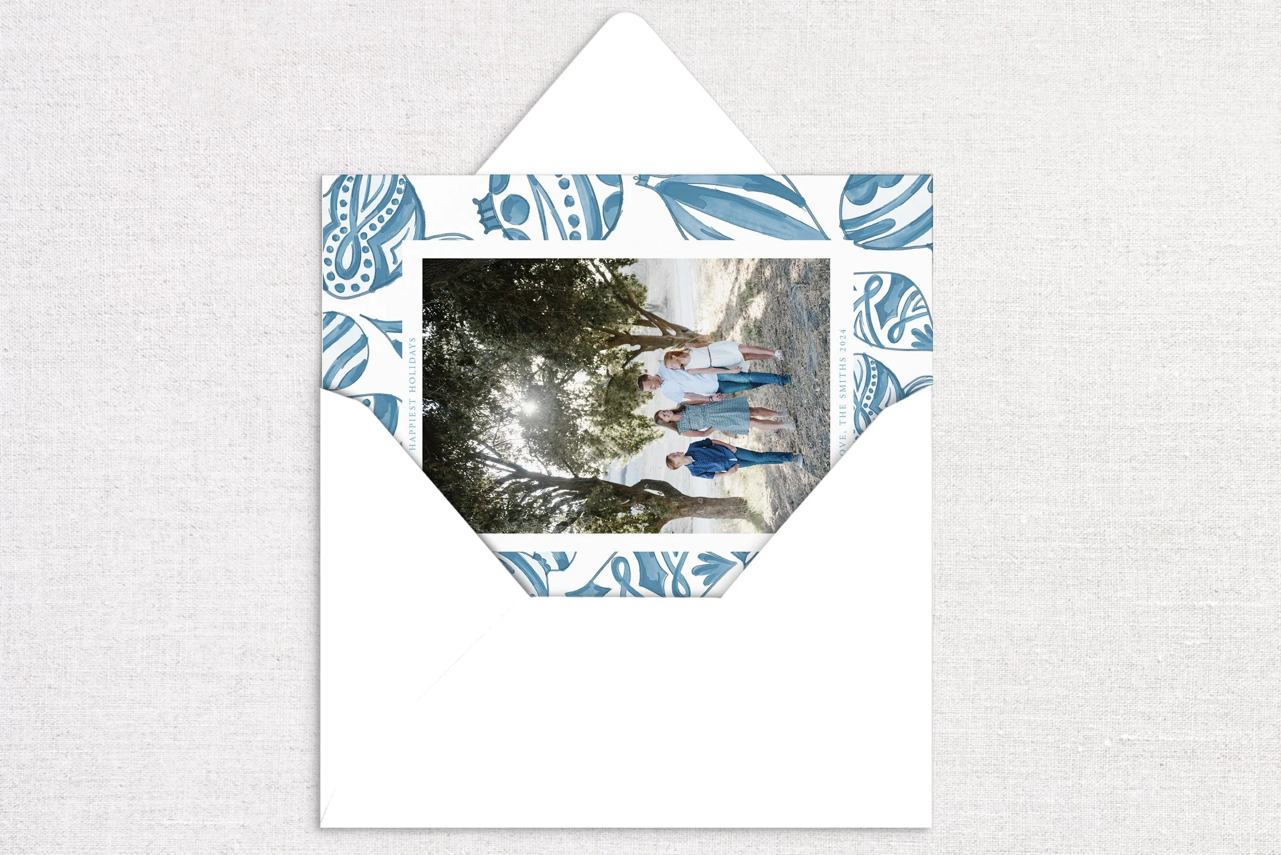 64holiday-card-card-opening-ornament-background-blue.jpg