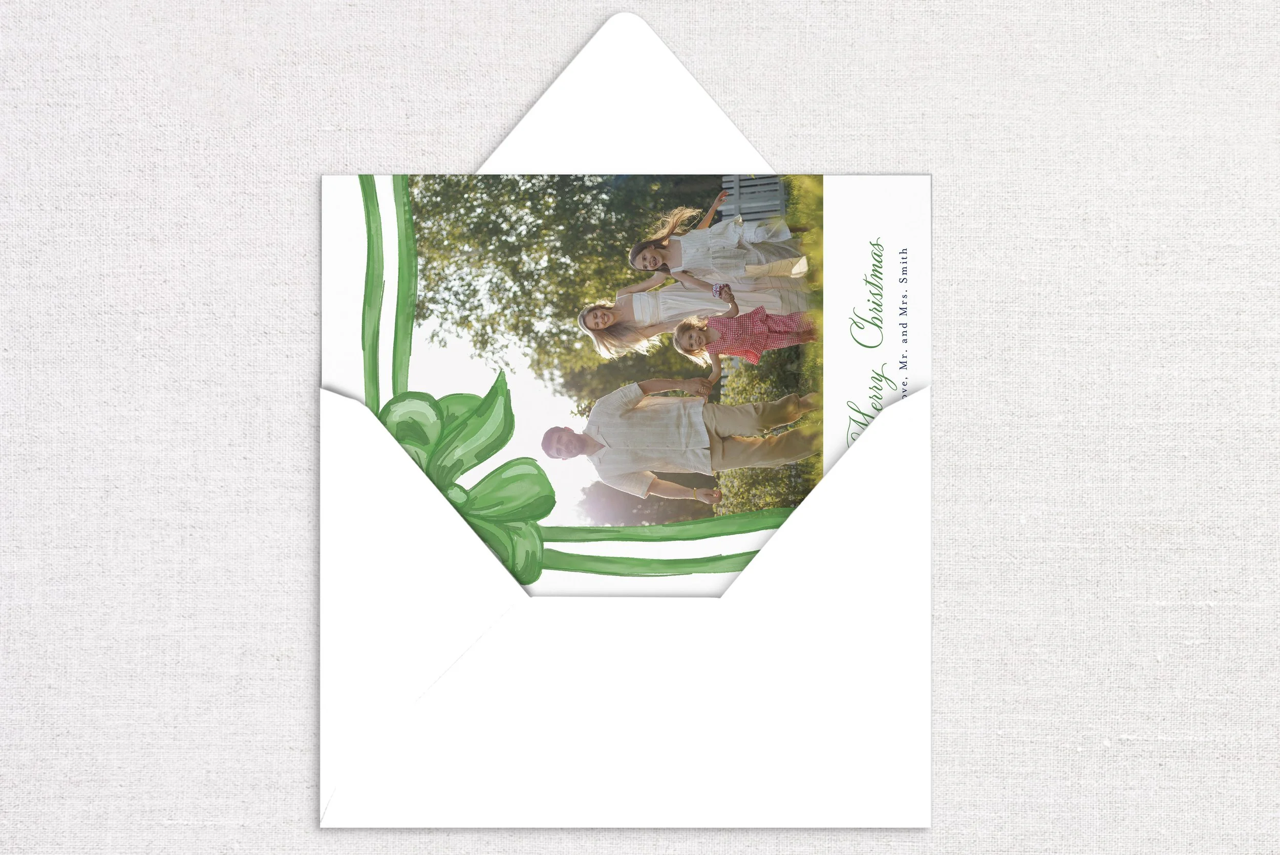 holiday-card-card-opening-gift-bow-green.jpg