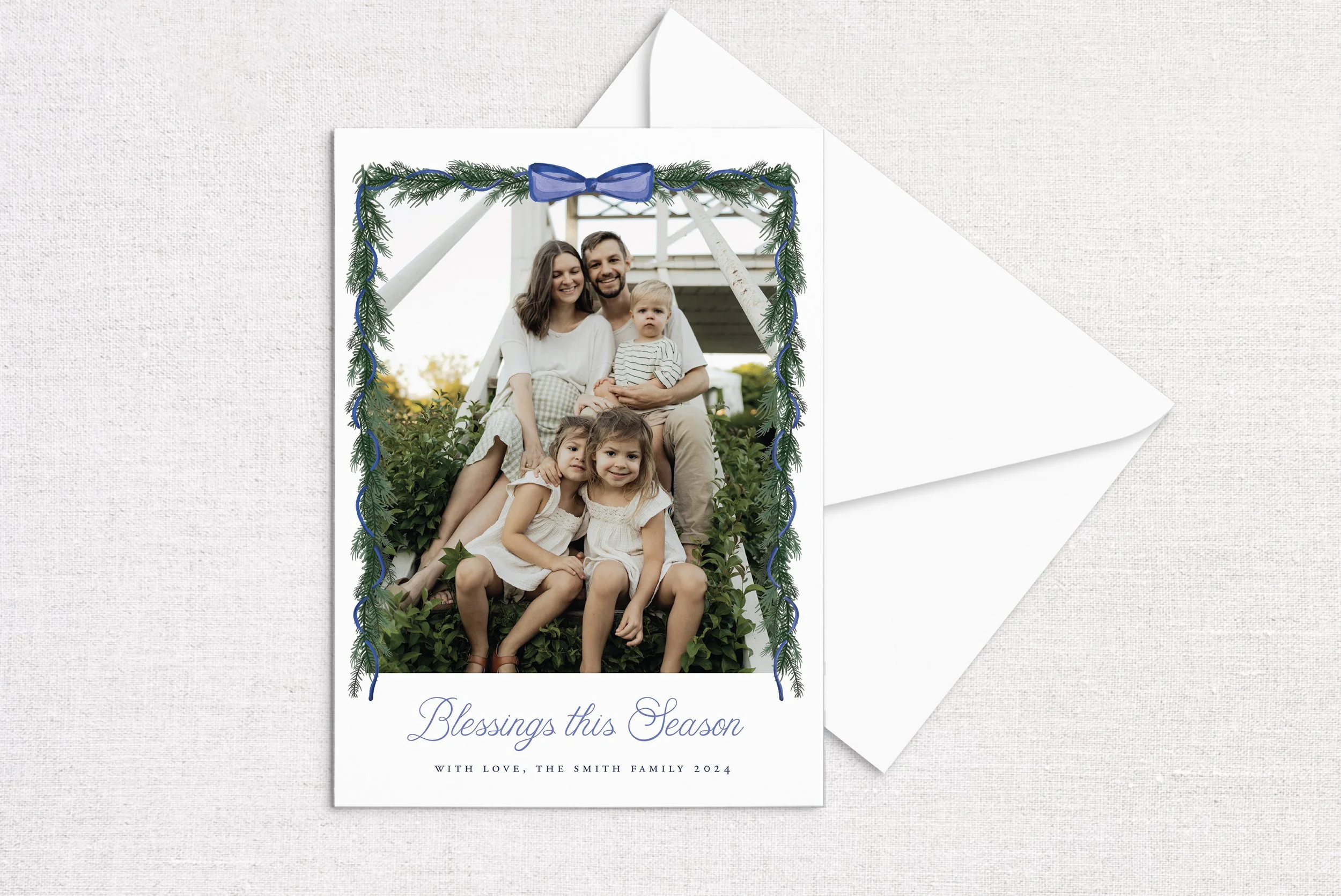 holiday-card-flatlay-blue-bow-garland.jpg
