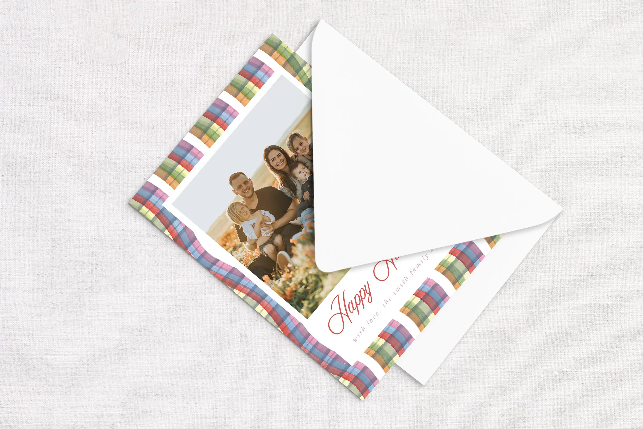 107holiday-card-envelope-plaid-ribbon-background.jpg