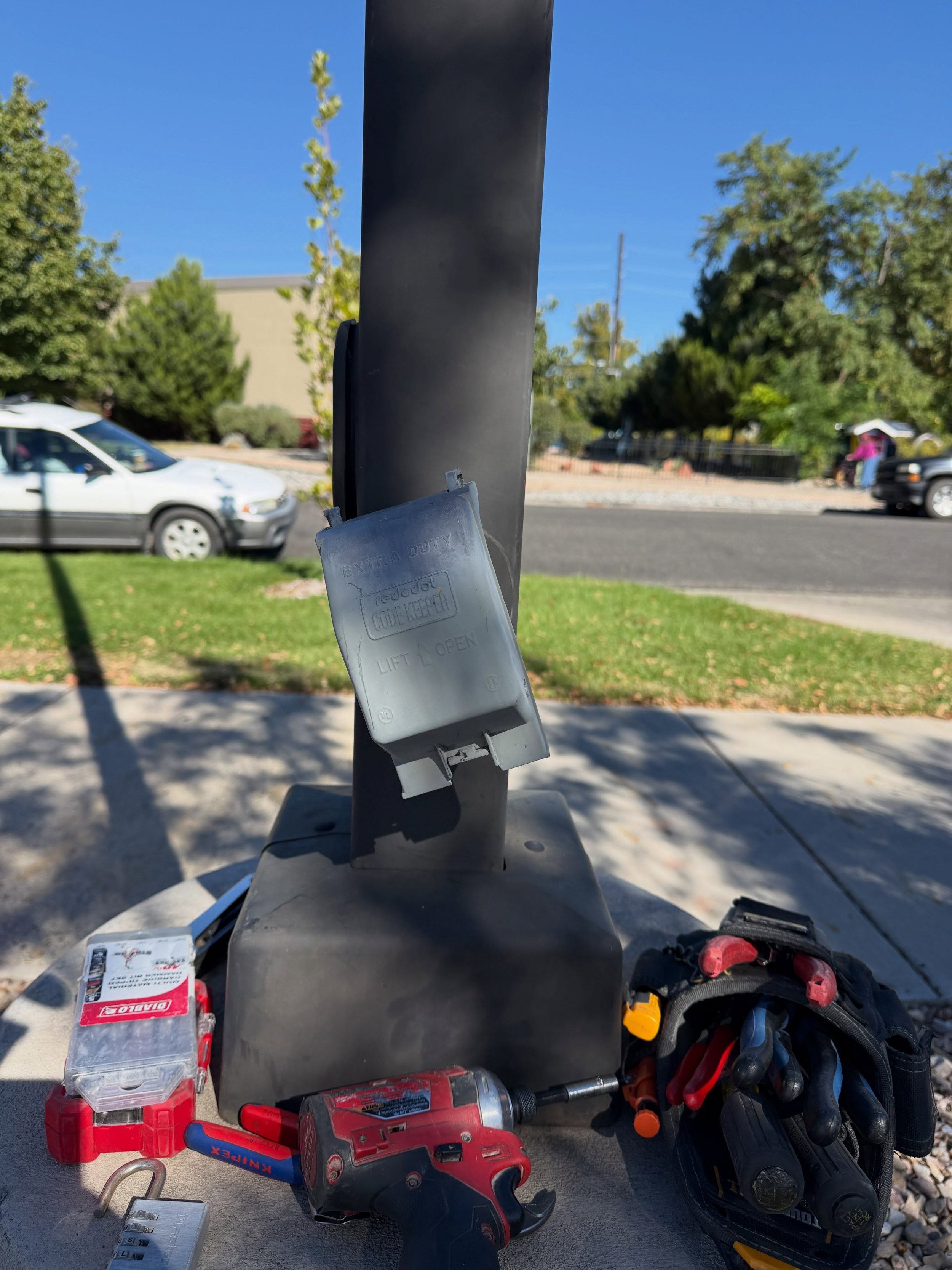 Was called out to replace the pole light, secured this box. Leave the place better than you found it!