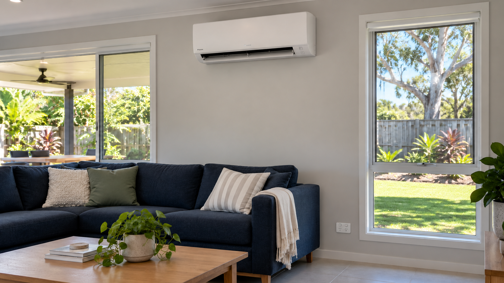 Daikin split system and Clipsal power point in a renovated Brisbane lounge