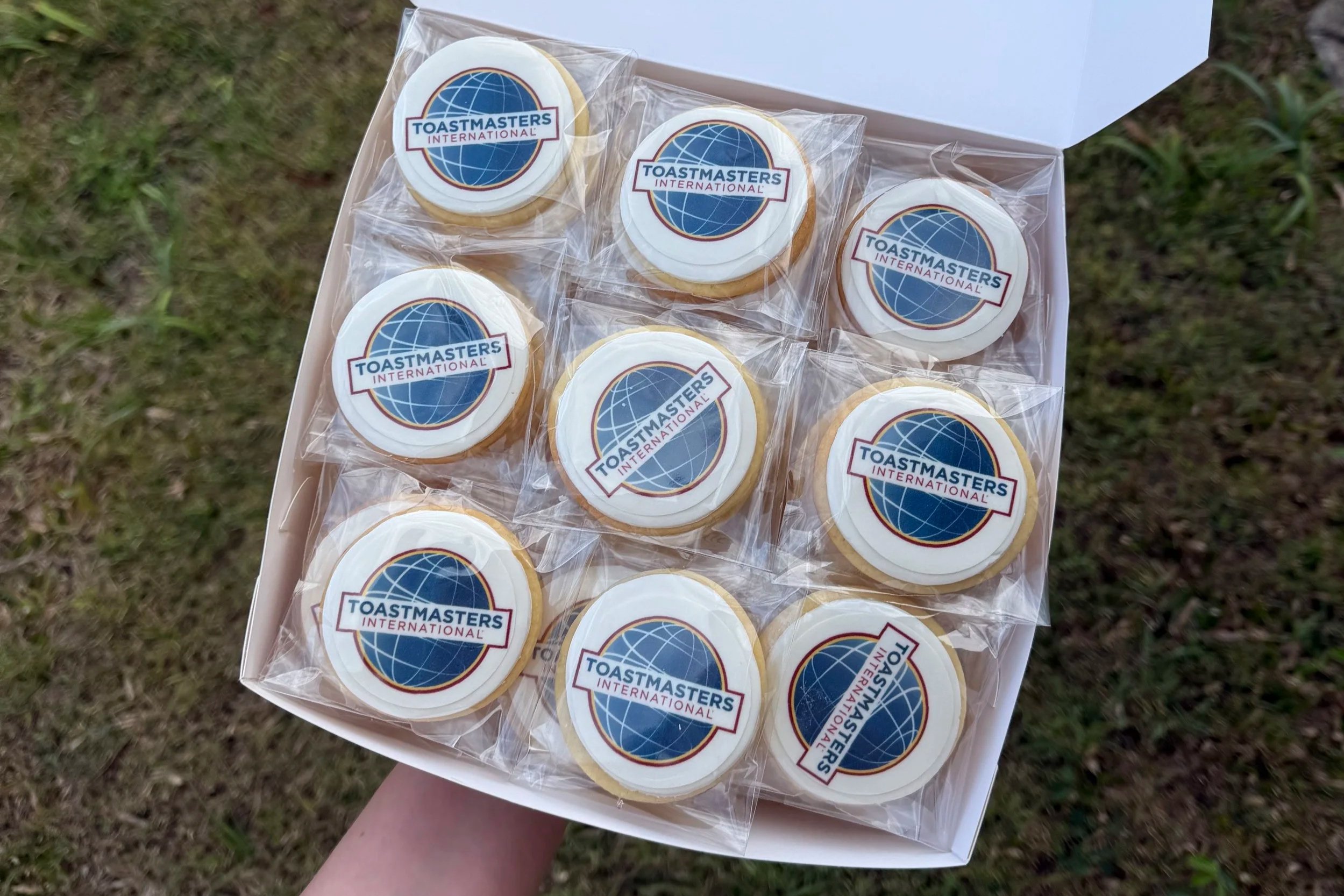 Custom corporate cookies. Vanilla sugar cookies with fondant icing including edible image printed on top or a corporate logo
