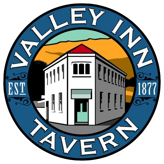 Logo of Valley Inn Tavern with a building illustration and mountain background, surrounded by a blue circle with white text.