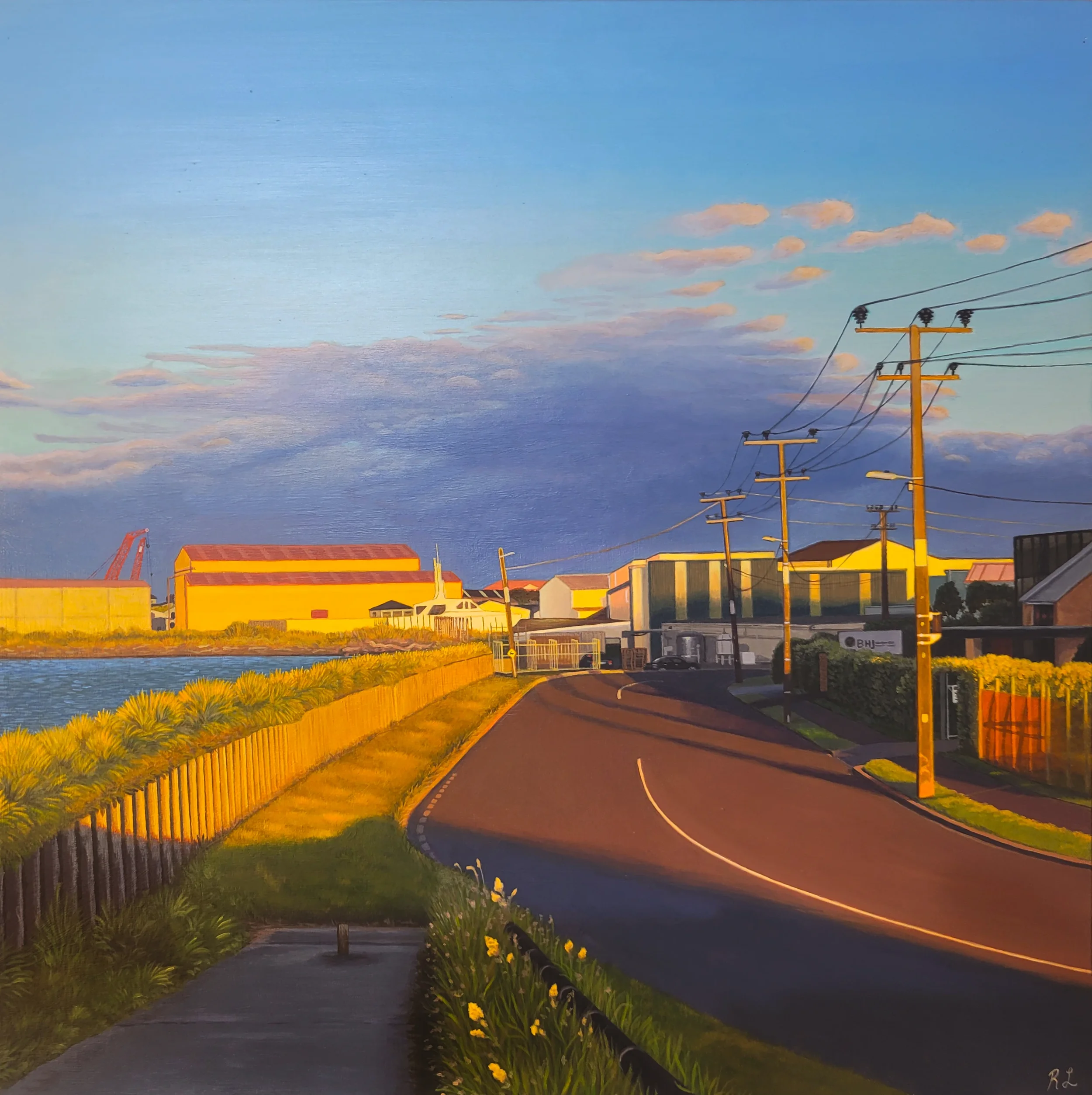 Acrylic painting of a waterfront industrial neighborhood with a curving road, utility poles, colorful warehouses, grasses, and a dramatic blue sunrise sky.