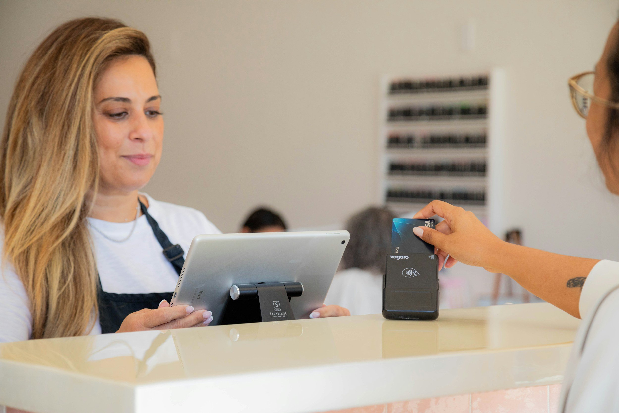 Patient paying for a visit with a card at the front desk