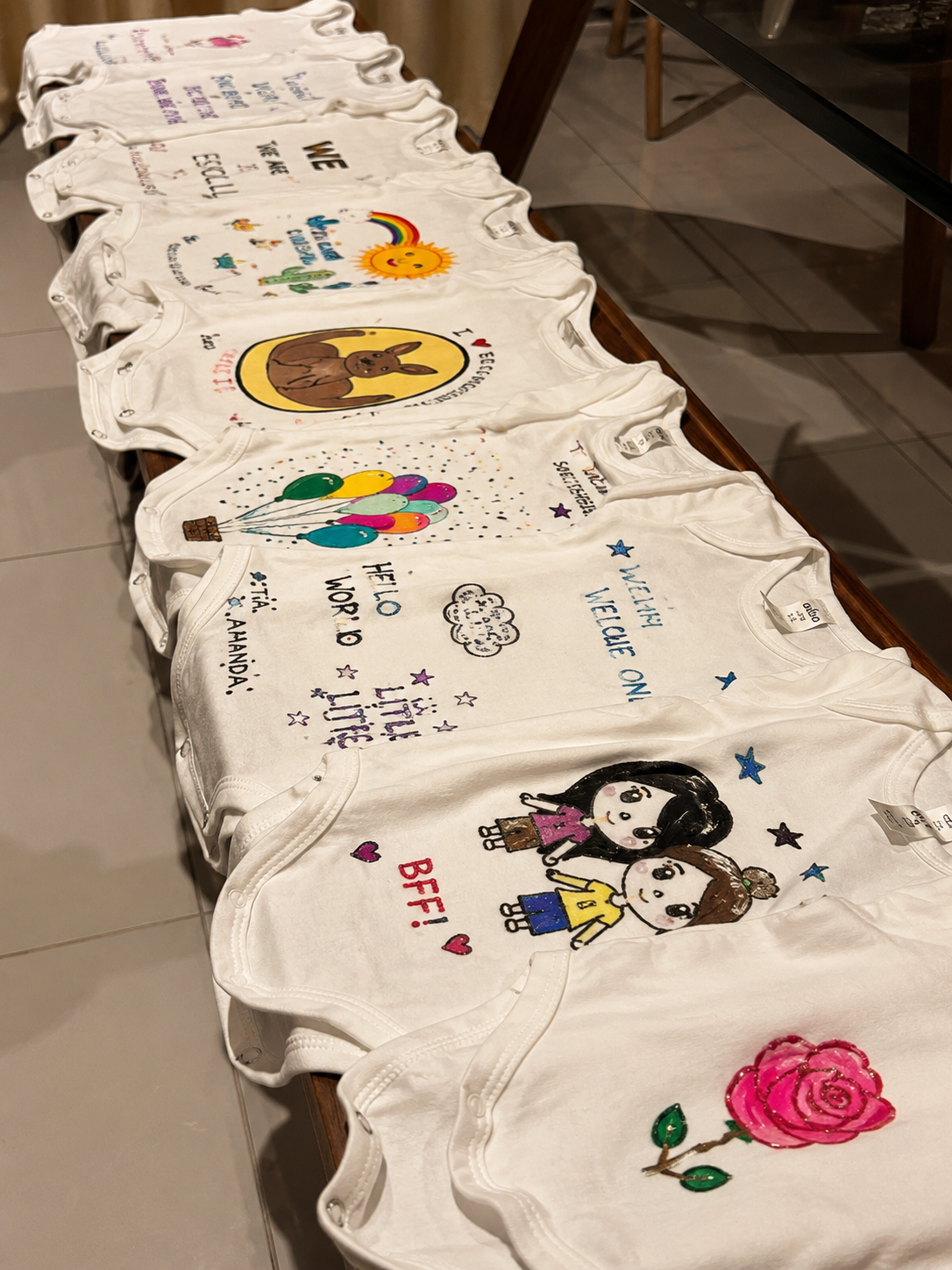 Baby bodysuit painting add-on for a baby shower picnic, Gold Coast