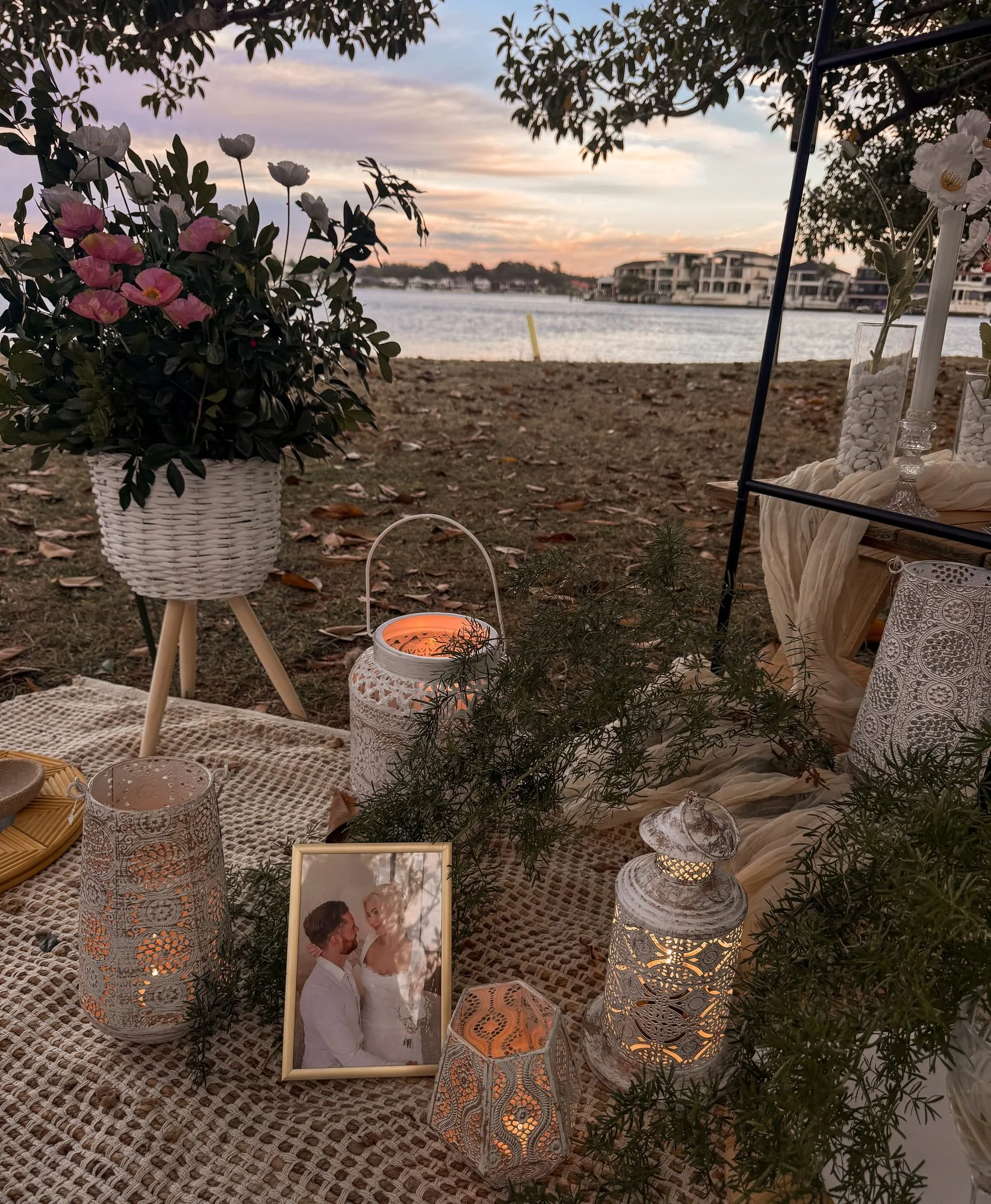 Picnic at sunset with lanterns, candles and pink florals, Gold Coast