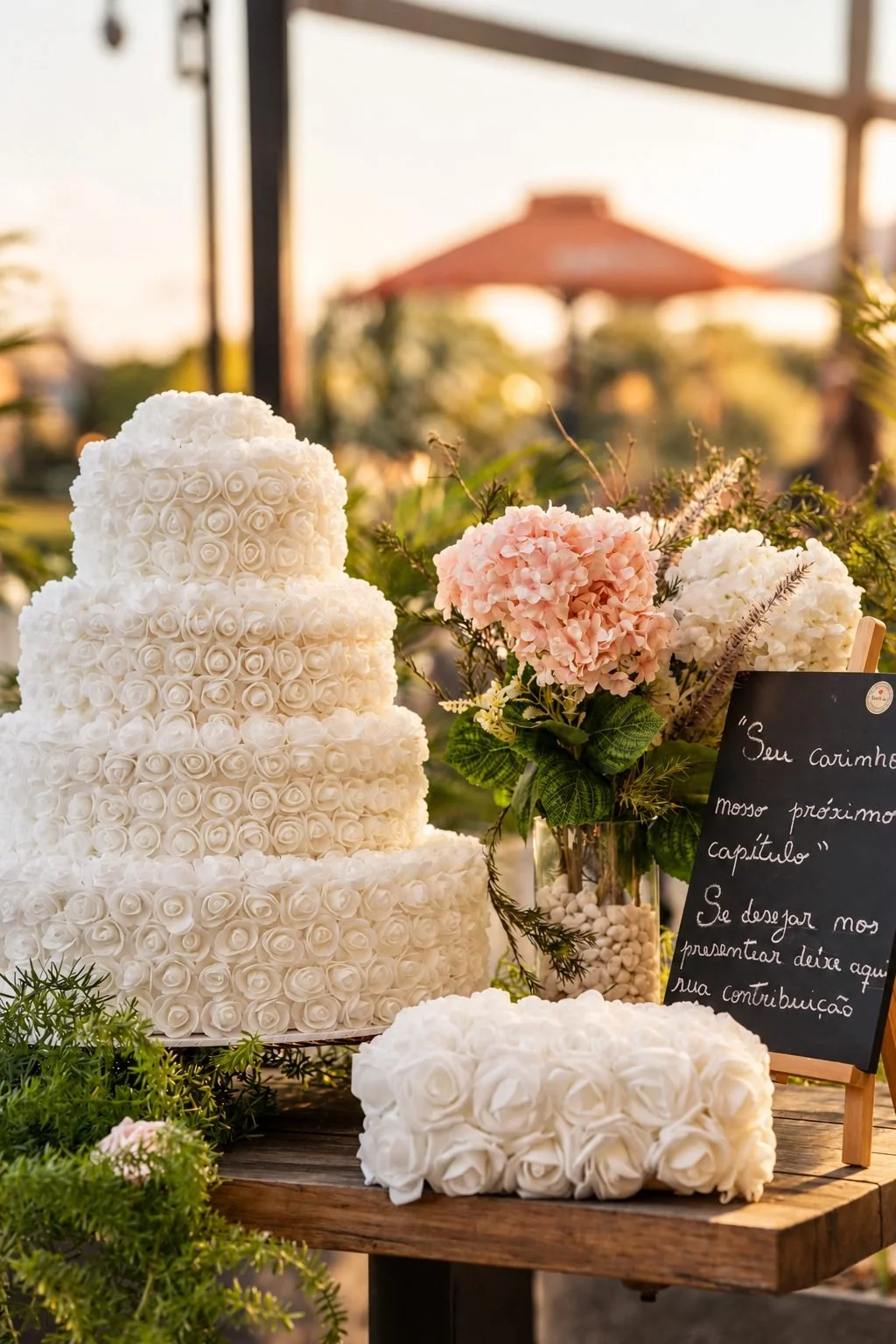 Dessert table with a white rose cake, florals and a chalkboard sign, Gold Coast