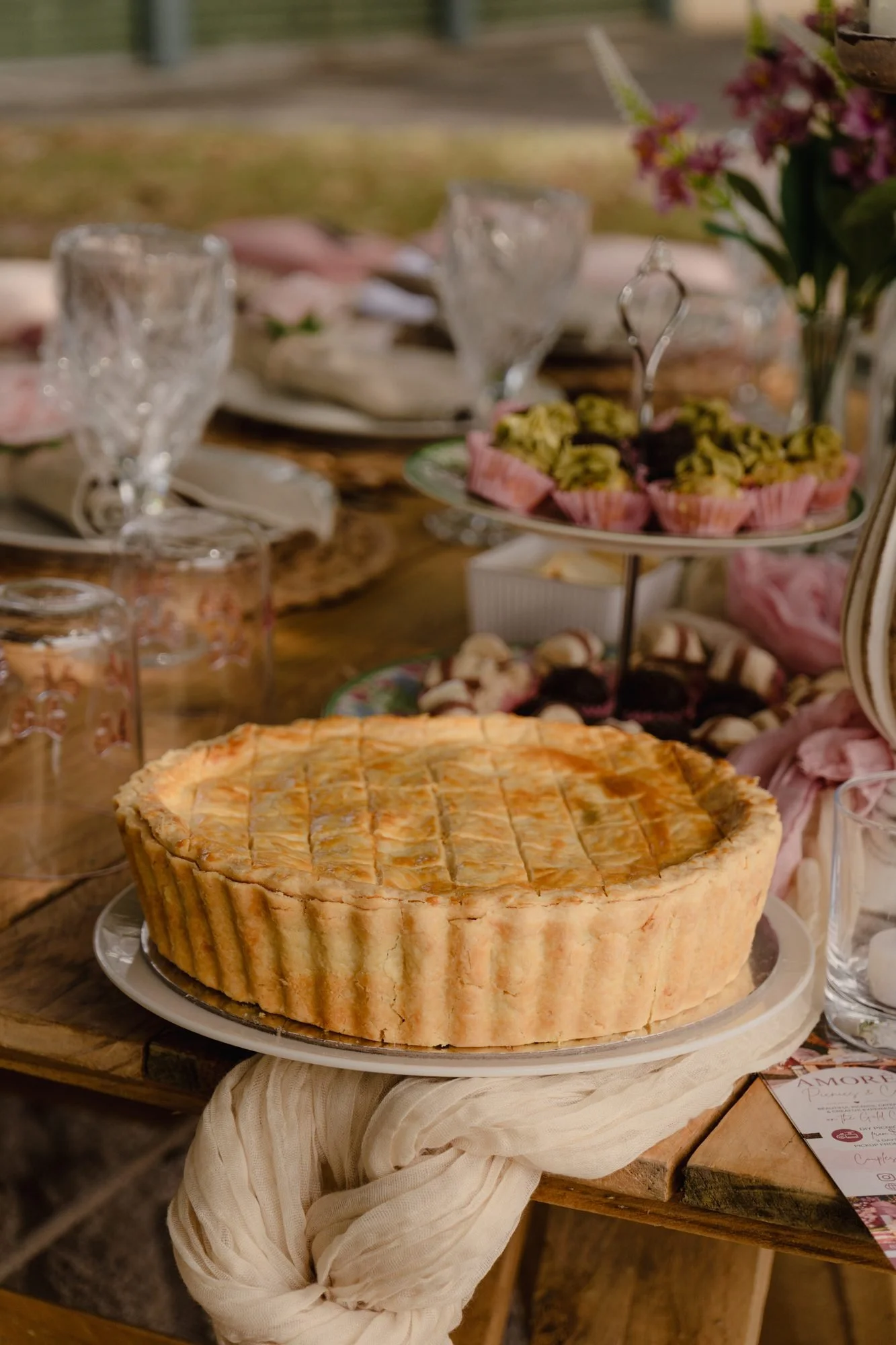 Savoury pie and grazing treats on a picnic table, Gold Coast