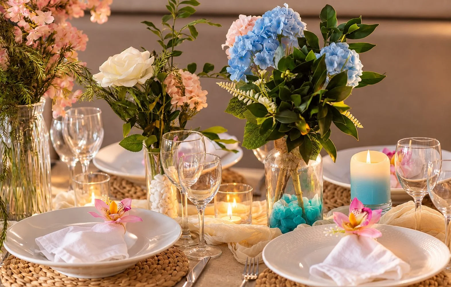 Floral place setting with hydrangeas, candles and woven placemat, Gold Coast