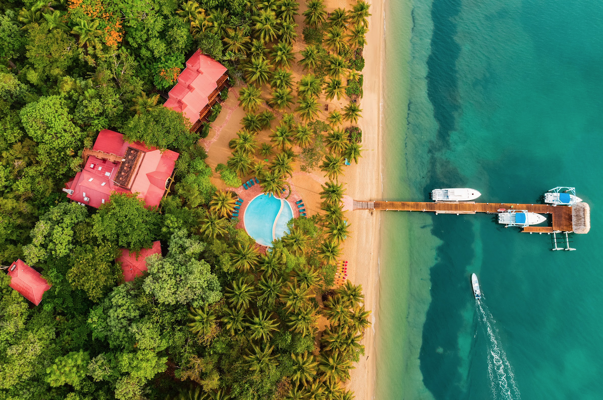Beach aerial with boat.png