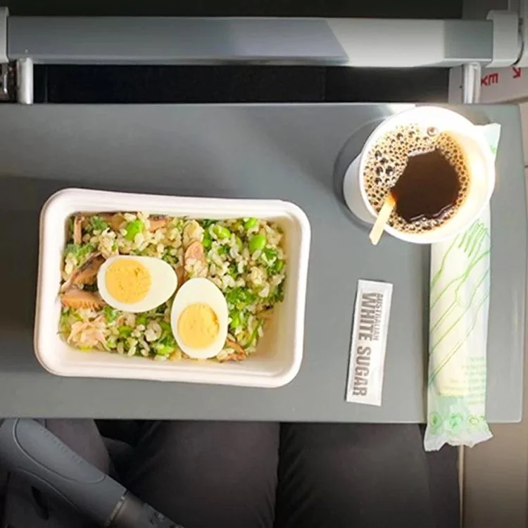 Qantas was one of the first airlines to launch a zero-waste flight using BioPak's compostable products. Passengers enjoyed their meal service using their eco-friendly cutlery and food packaging. After the service, the cabin crew, called the Green Tea