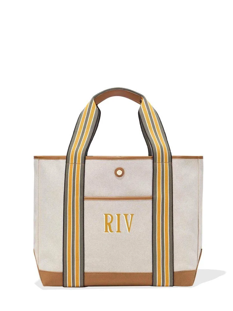 The Large Cabana Tote, perfectly oversized for beach and work trips, as an overnight bag, or as a companion for any journey. Crafted from EcoCraft Canvas®, made from 33 upcycled plastic bottles, featuring recycled vegan leather details.