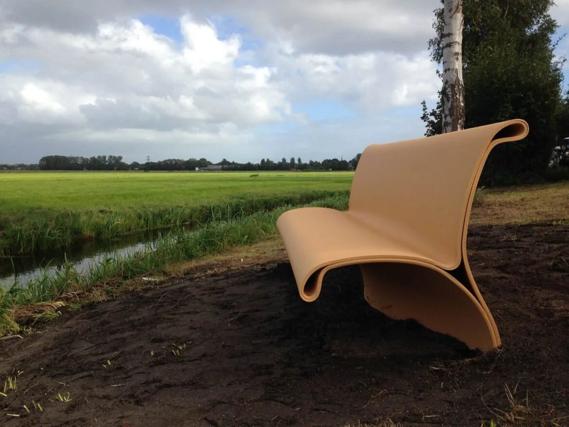 Dutch research and design studio, The New Raw have created outdoor benches from recycled plastic waste and 3D printing. Water drainage and a solid foundation are integrated in the organic design.