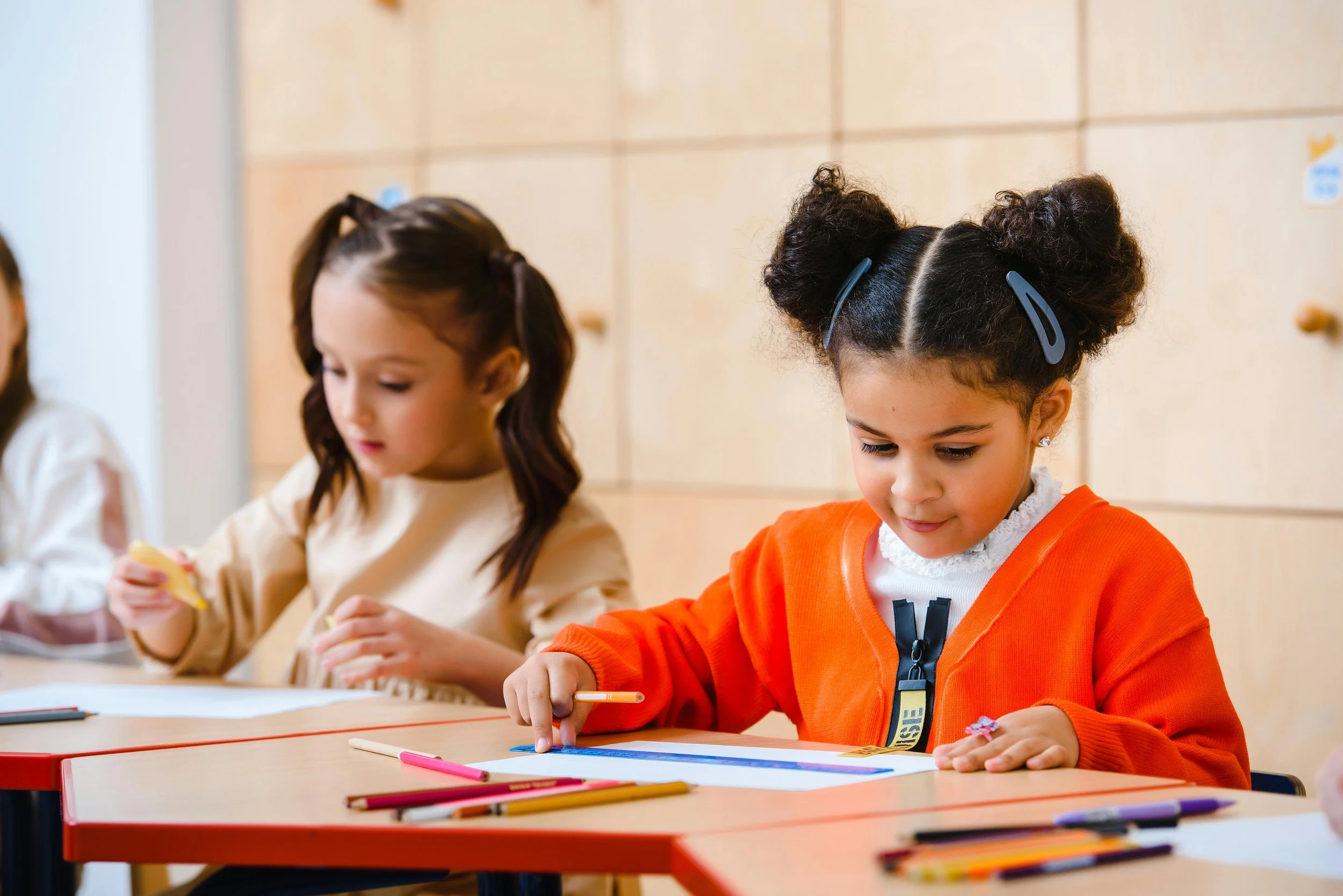 Early years and primary learners building international school readiness and cooperative attention through play-based literacy milestones in Hong Kong
