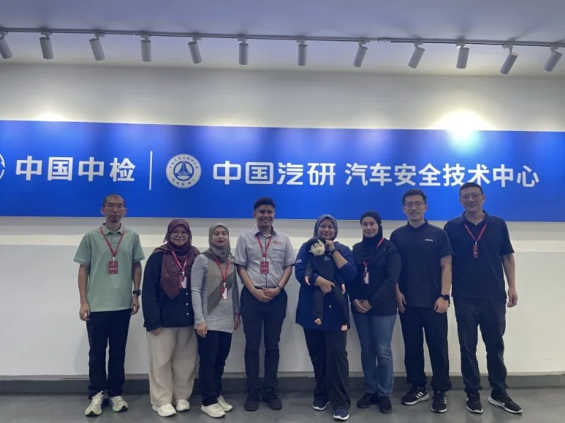 Group photo of UTM–ACTS, ASEAN NCAP, and CAERI representatives during the initial validation visit for the ASEAN CPD-DS3 Dummy at CAERI's Automotive Safety Technology Center in China.