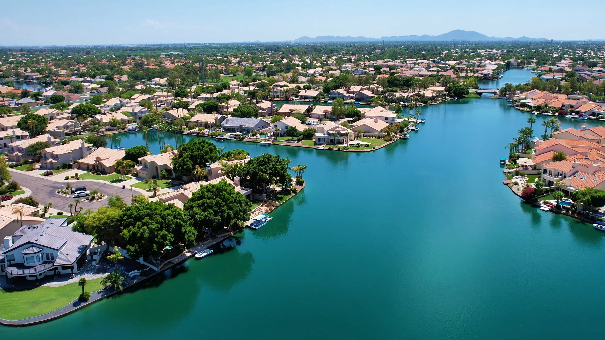 Waterfront homes with boat docks at Val Vista Lakes in Gilbert, Arizona
