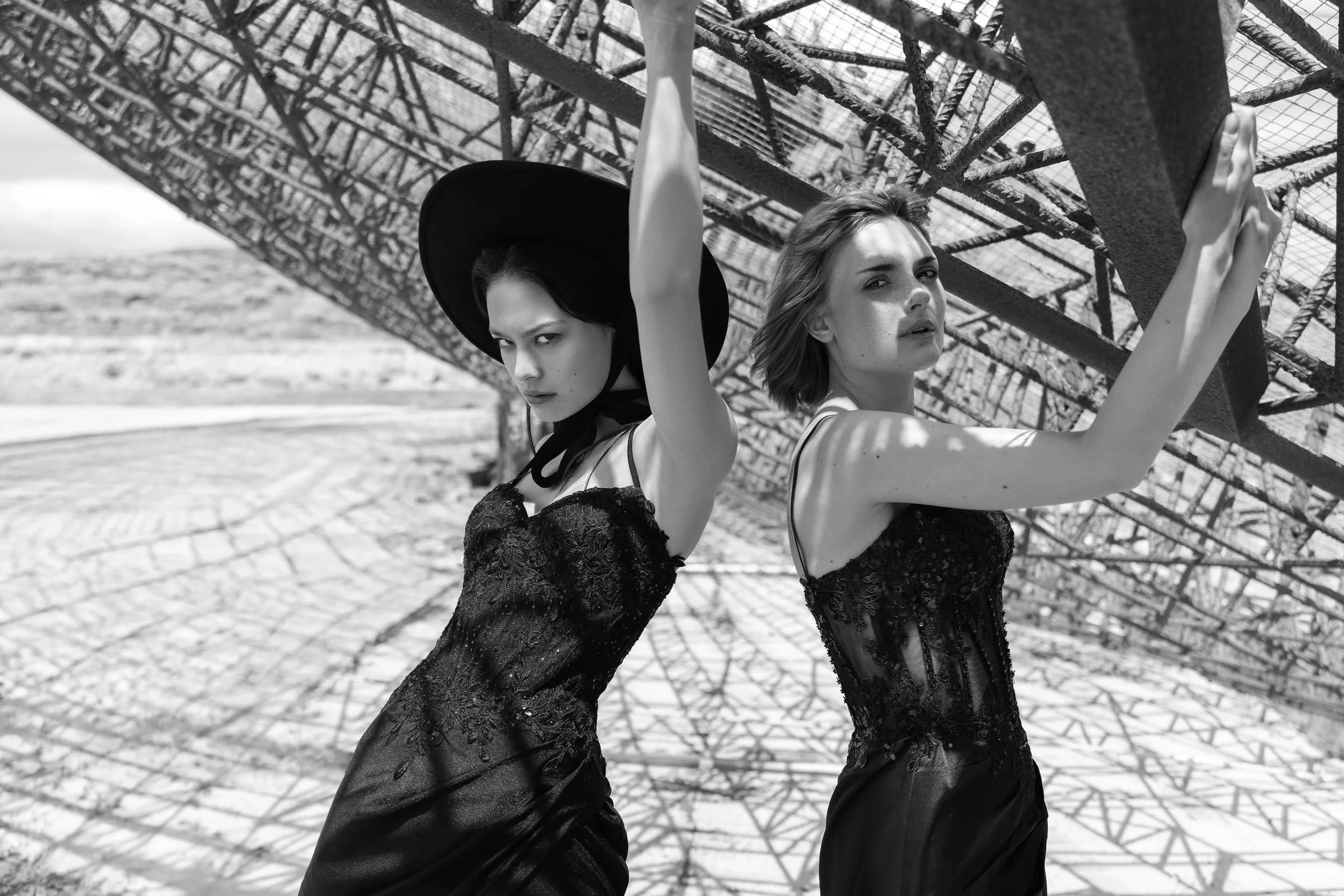 home-editorial-metal-structure-two-models-bw.jpg